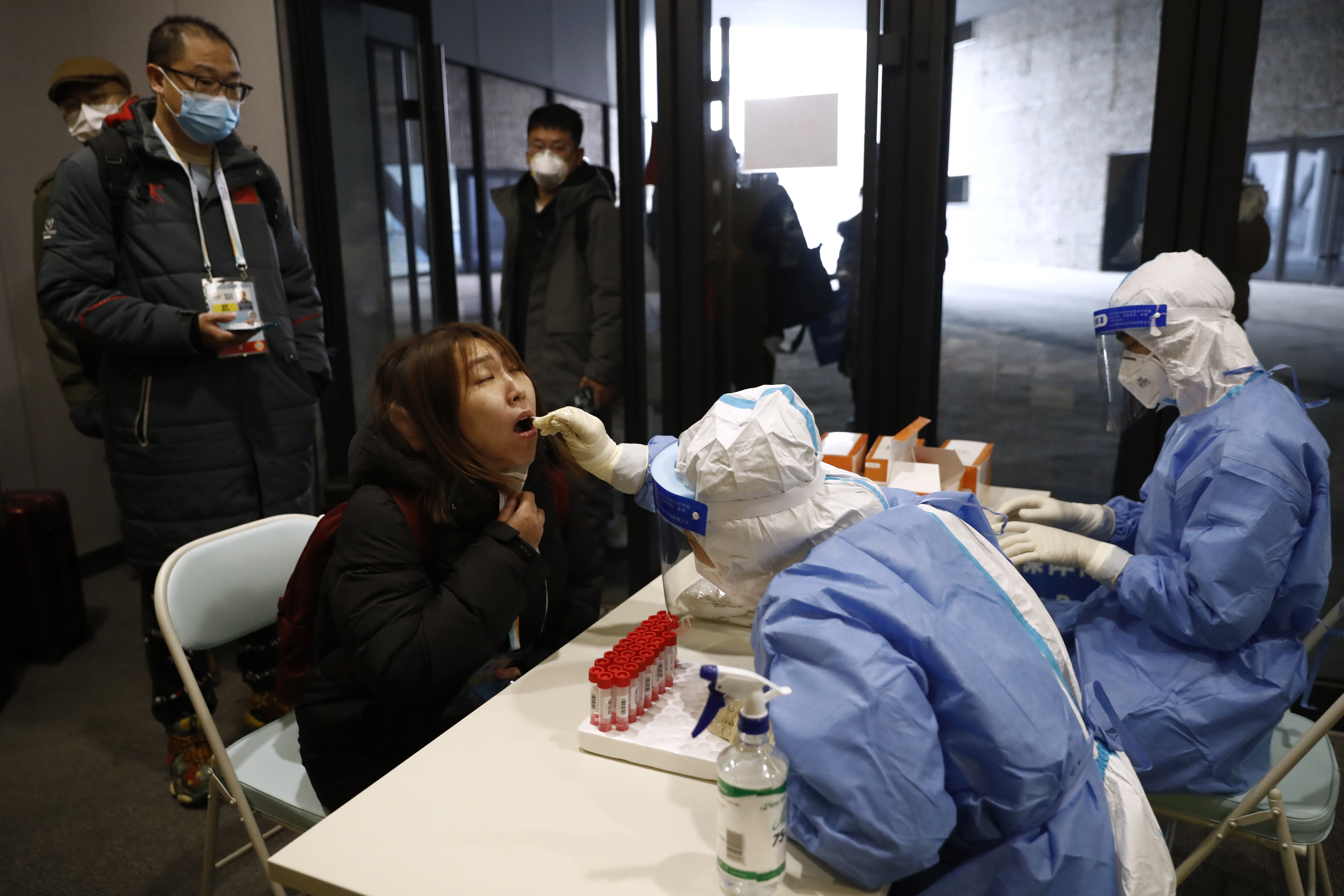 Skeleton - Beijing 2022 Winter Olympics Test Event - IBSF Skeleton International Sanctioned Race - Yanqing National Sliding Center, Yanqing, China - October 25, 2021 A member of the media is tested for the coronavirus disease (COVID-19) REUTERS/Tingshu Wang