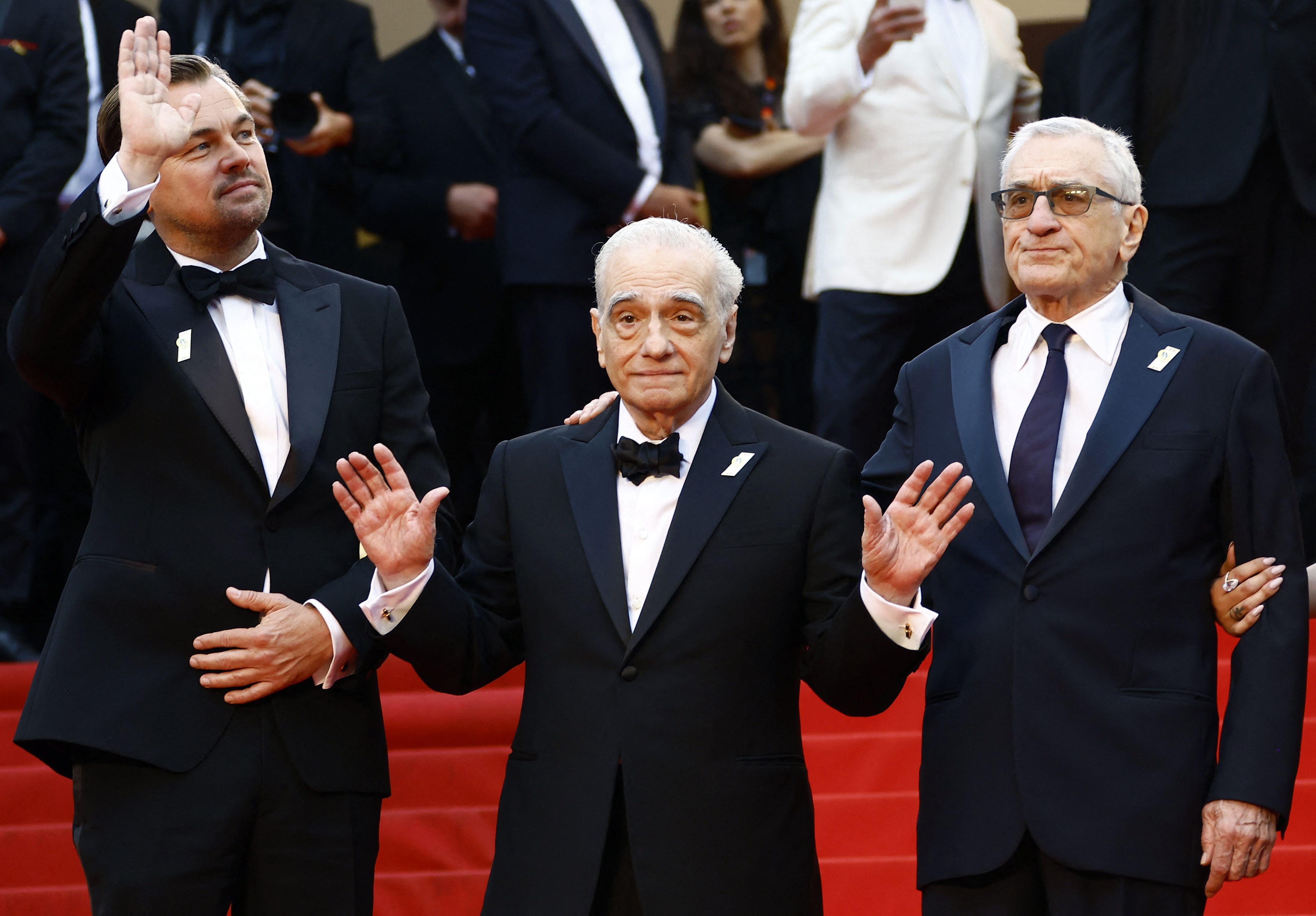 El 76º Festival de Cannes, el director Martin Scorsese y los miembros del reparto Leonardo DiCaprio y Robert de Niro posaron sobrios y elegantes REUTERS/Eric Gaillard 