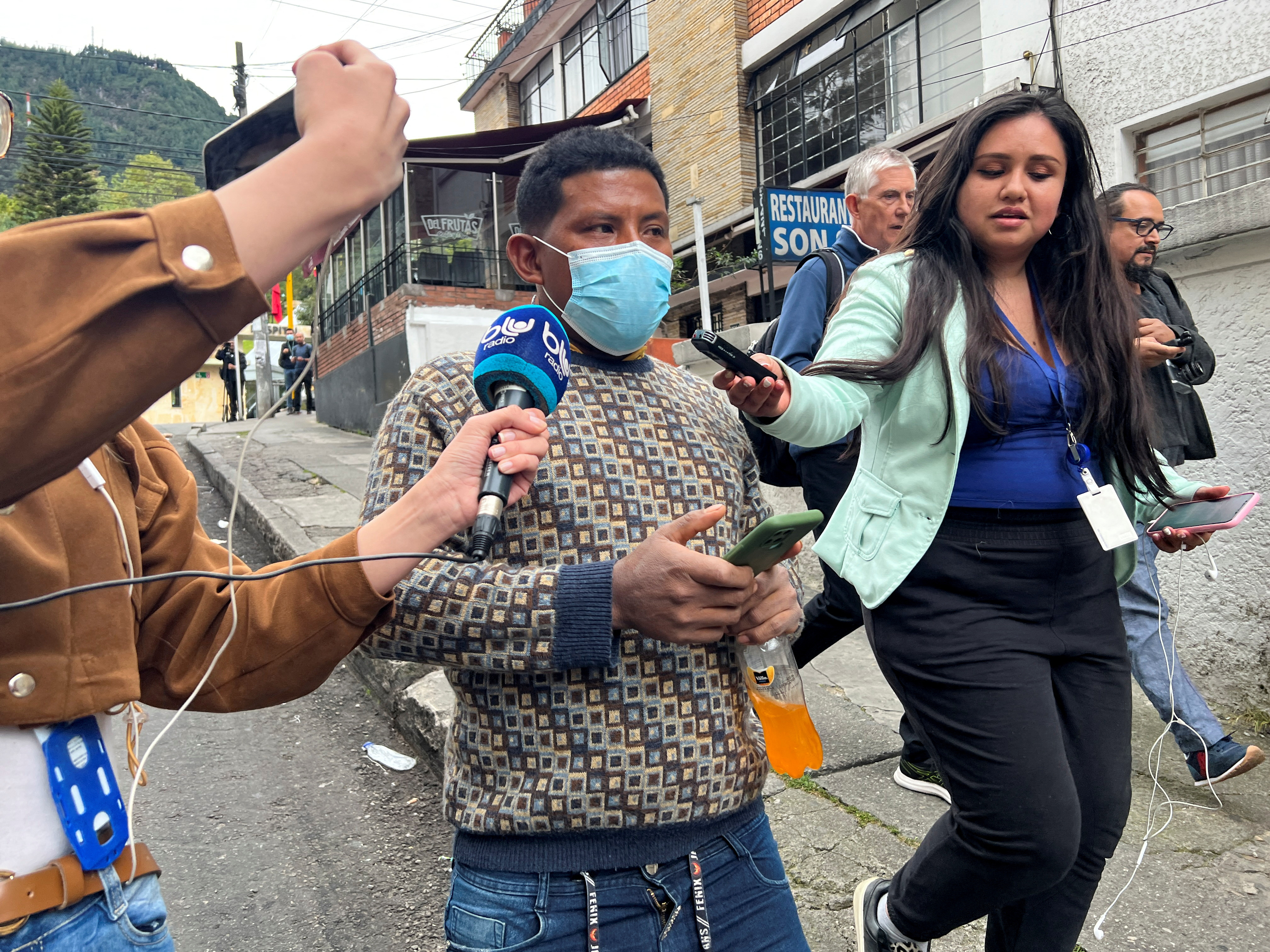 Manuel Ranoque, father of the child survivors of a Cessna 206 plane, that crashed in thick jungle, speaks to the media, near the central military hospital, where the children are hospitalised, Bogota, Colombia June 11, 2023. REUTERS/Herbert Villarraga