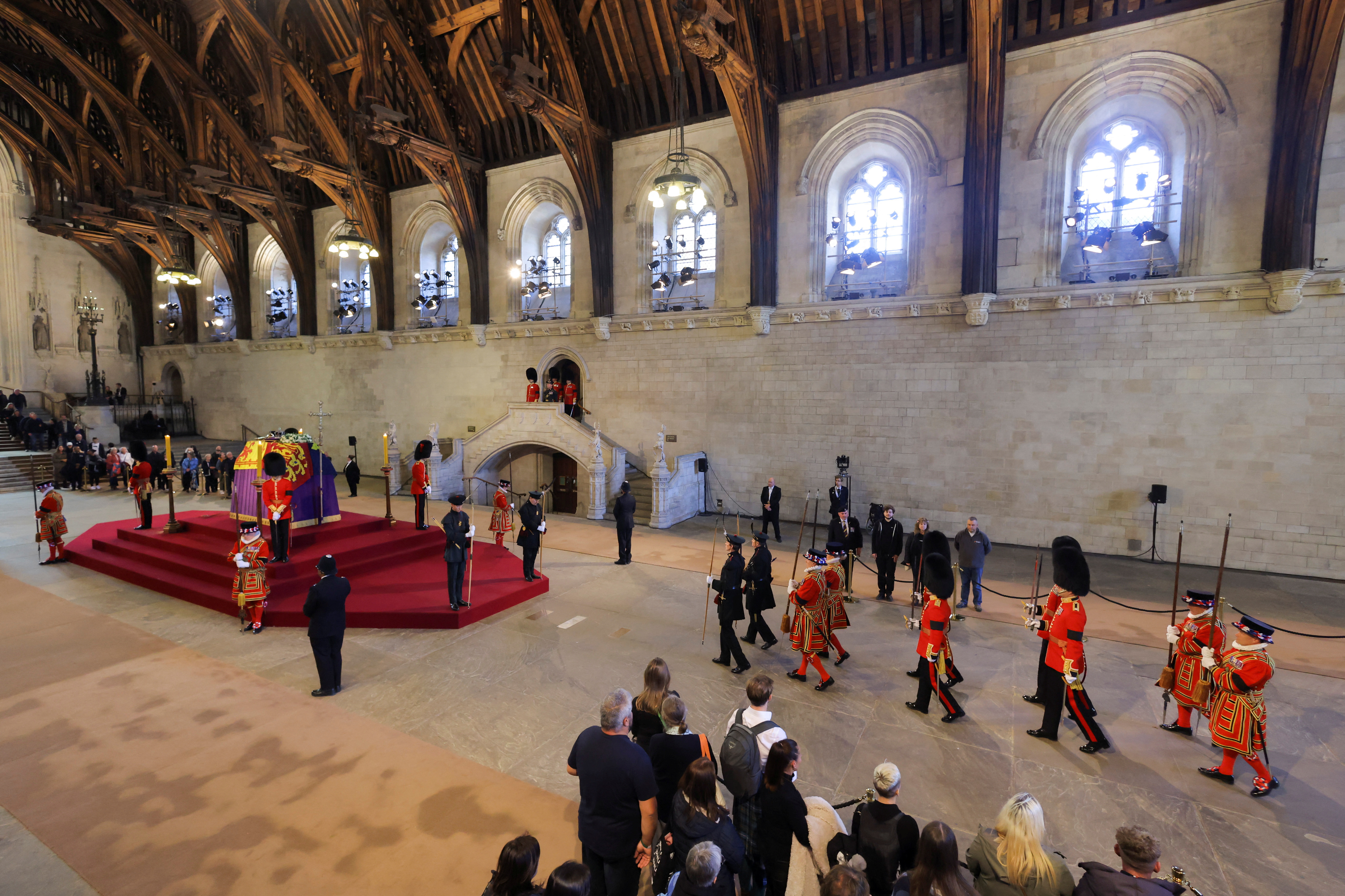 Royal guards march during a vigil as people pay their respects to the coffin of Britain's Queen Elizabeth inside Westminster Hall, following her death, in London, Britain, September 17, 2022. REUTERS/Marko Djurica/Pool