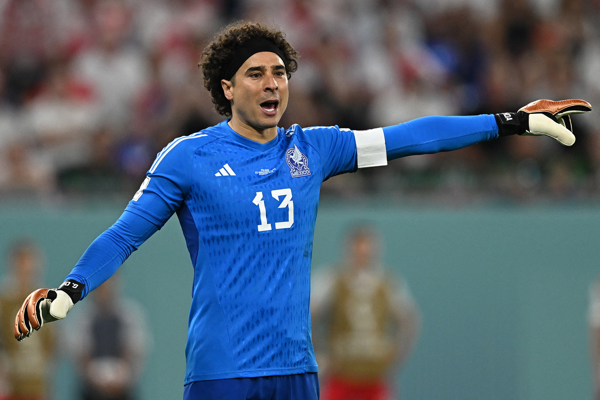 Mexico's goalkeeper #13 Guillermo Ochoa gestures during the Qatar 2022 World Cup Group C football match between Mexico and Poland at Stadium 974 in Doha on November 22, 2022. (Photo by MANAN VATSYAYANA / AFP)