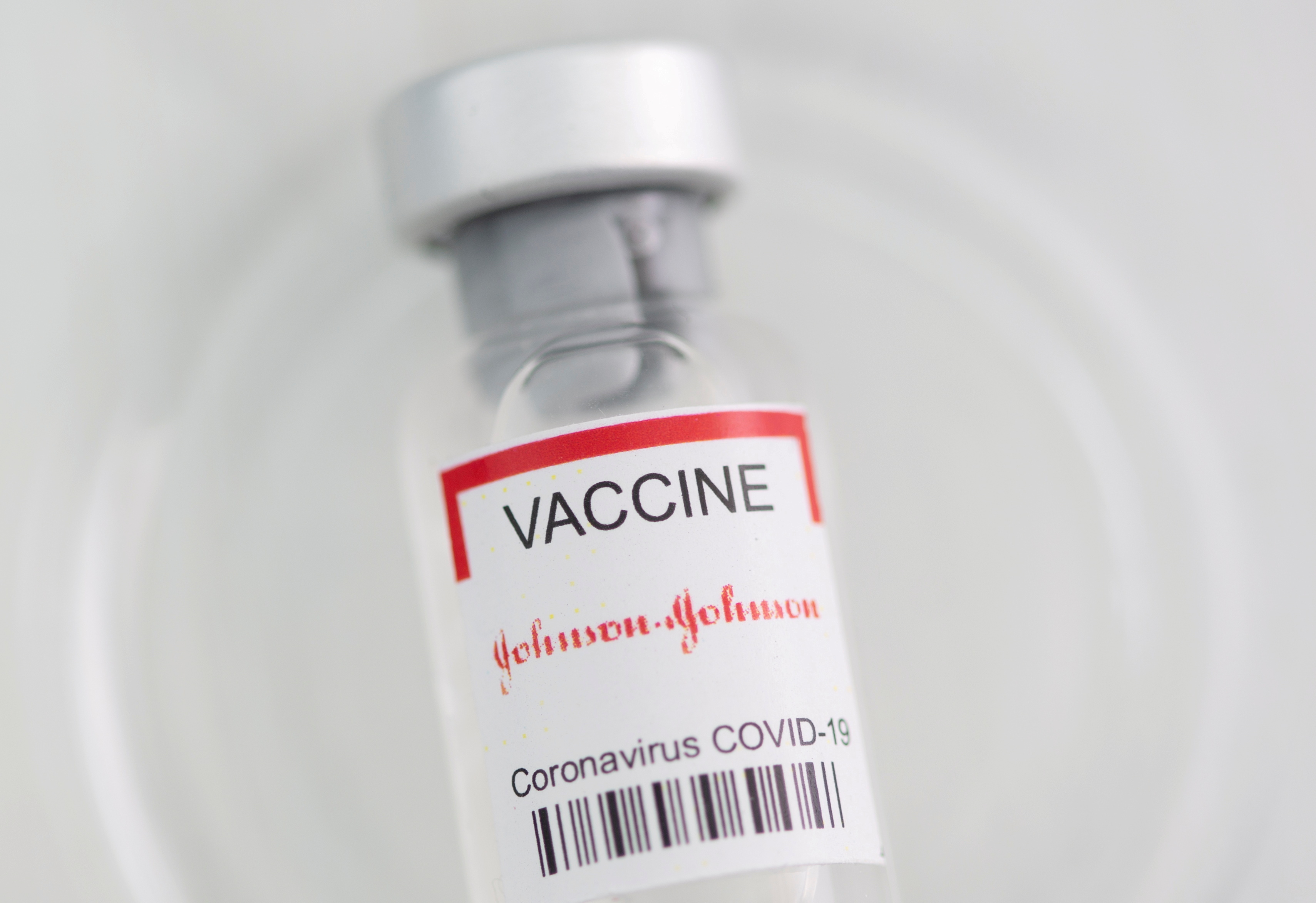 FILE PHOTO: A vial labelled "Johnson&Johnson coronavirus disease (COVID-19) vaccine" is seen in this illustration picture taken May 2, 2021. REUTERS/Dado Ruvic/Illustration/File Photo