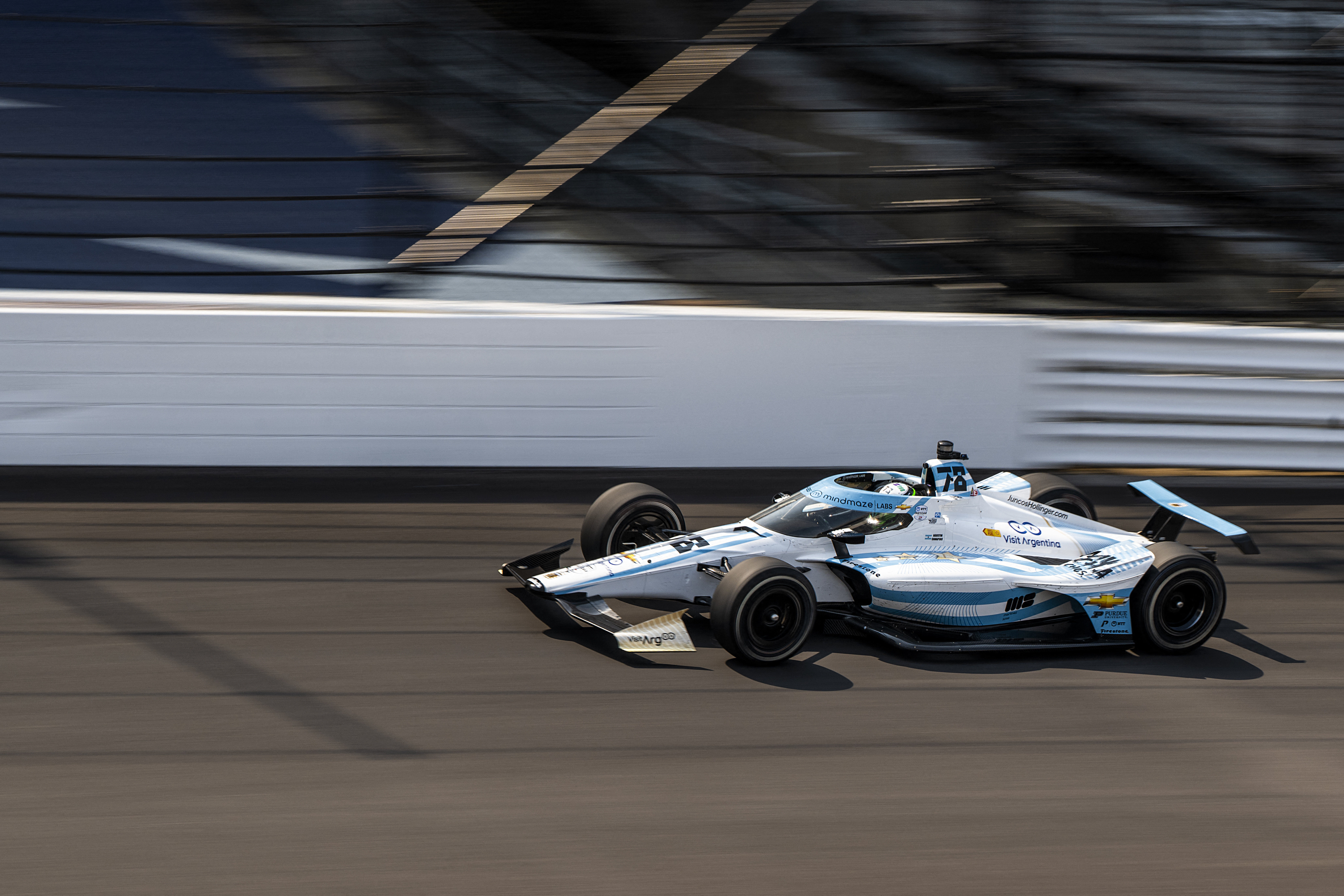 May 17, 2023; Speedway, Indiana, USA; Juncos Hollinger Racing driver Agustin Canapino (78) drives toward turn 1 during Indy500 practice at the Indianapolis Motor Speedway. Mandatory Credit: Marc Lebryk-USA TODAY Sports