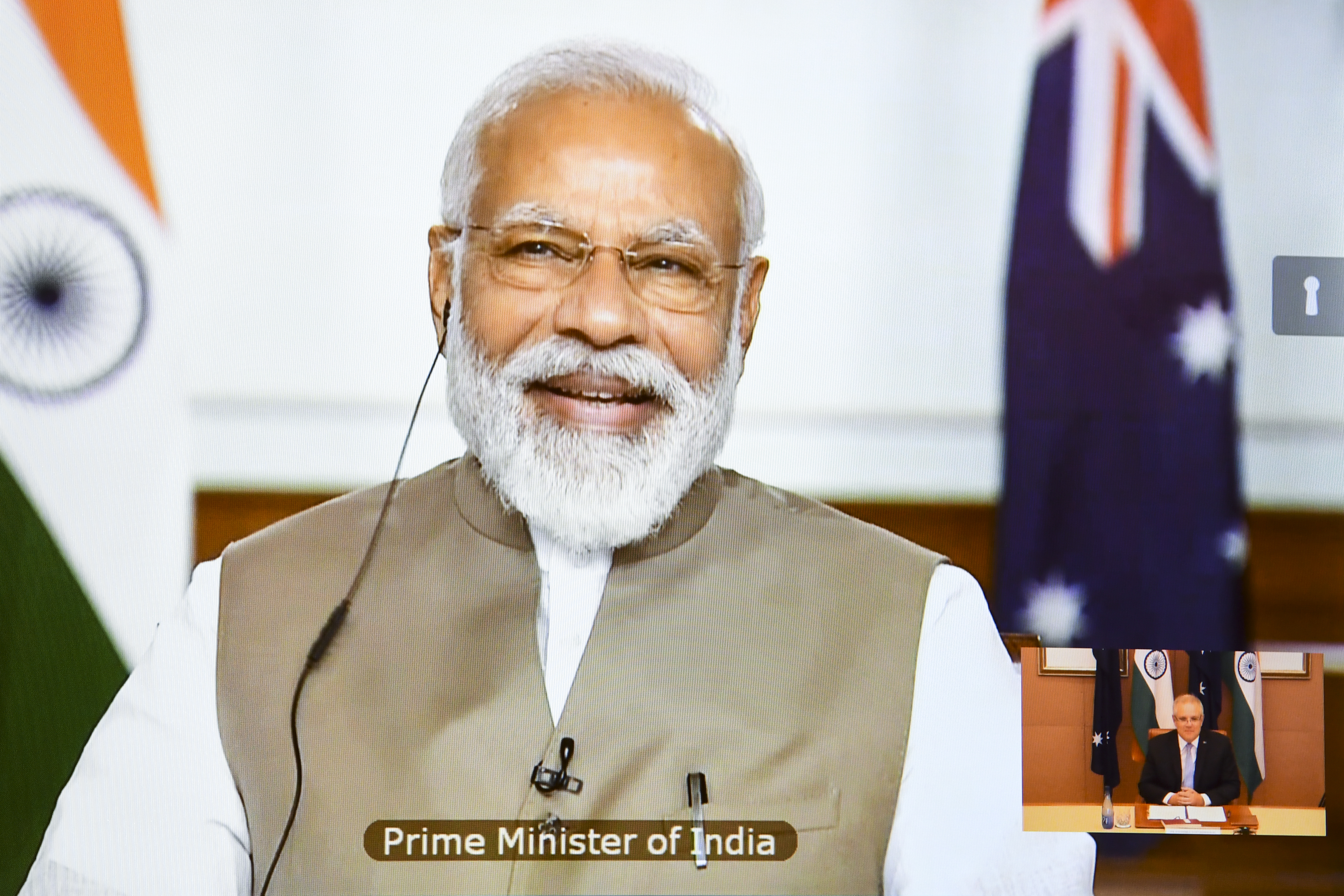 FOTO DE ARCHIVO: El primer ministro australiano, Scott Morrison, y el primer ministro indio, Narendra Modi, en una conferencia durante la Cumbre Virtual de Líderes 2020 entre Australia e India en la Casa del Parlamento en Canberra, el jueves 4 de junio de 2020. (AAP Image/Lukas Coch) 