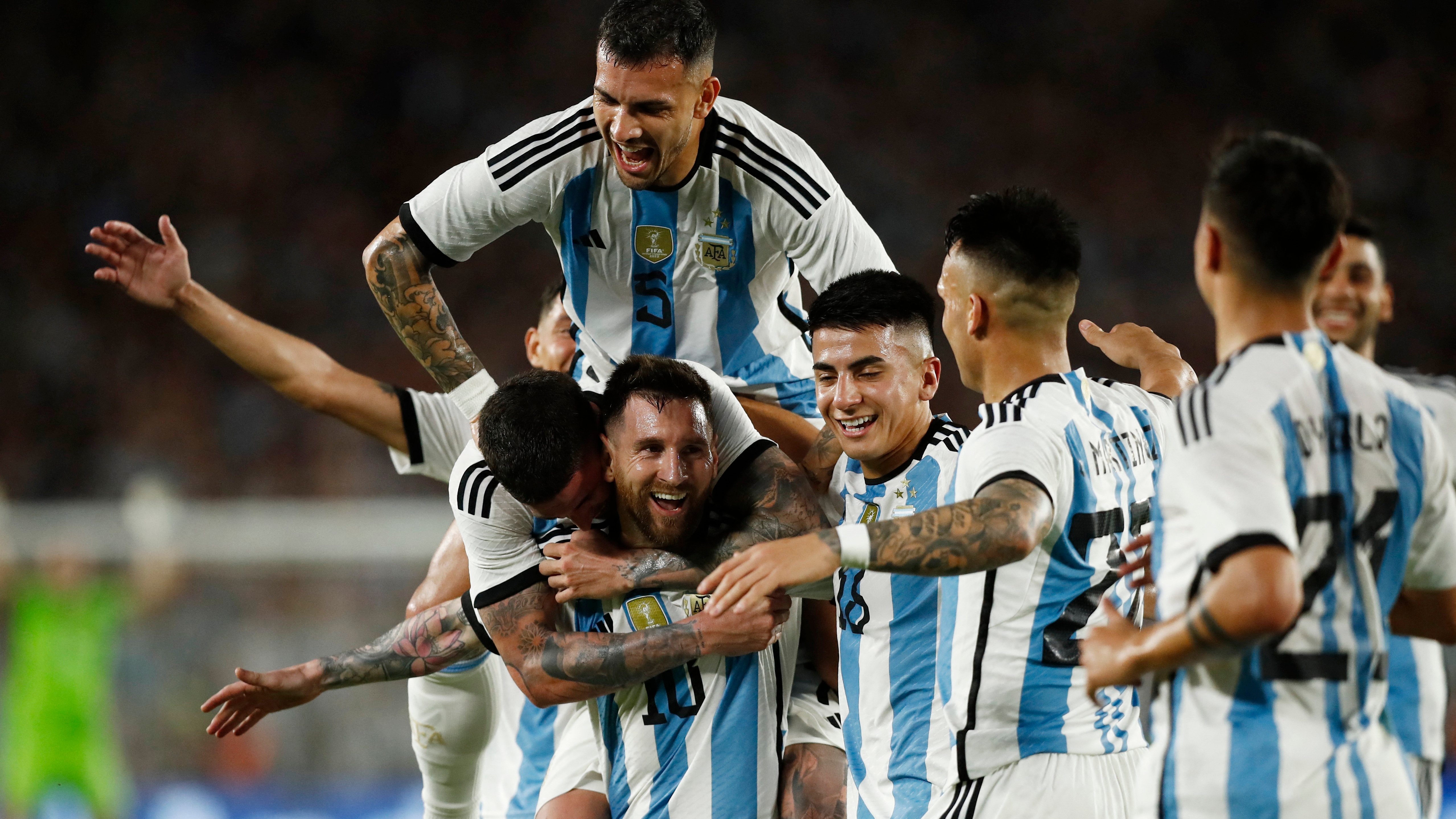 Soccer Football - International Friendly - Argentina v Panama - Estadio Monumental, Buenos Aires, Argentina - March 23, 2023 Argentina's Lionel Messi celebrates scoring their second goal with teammates REUTERS/Agustin Marcarian