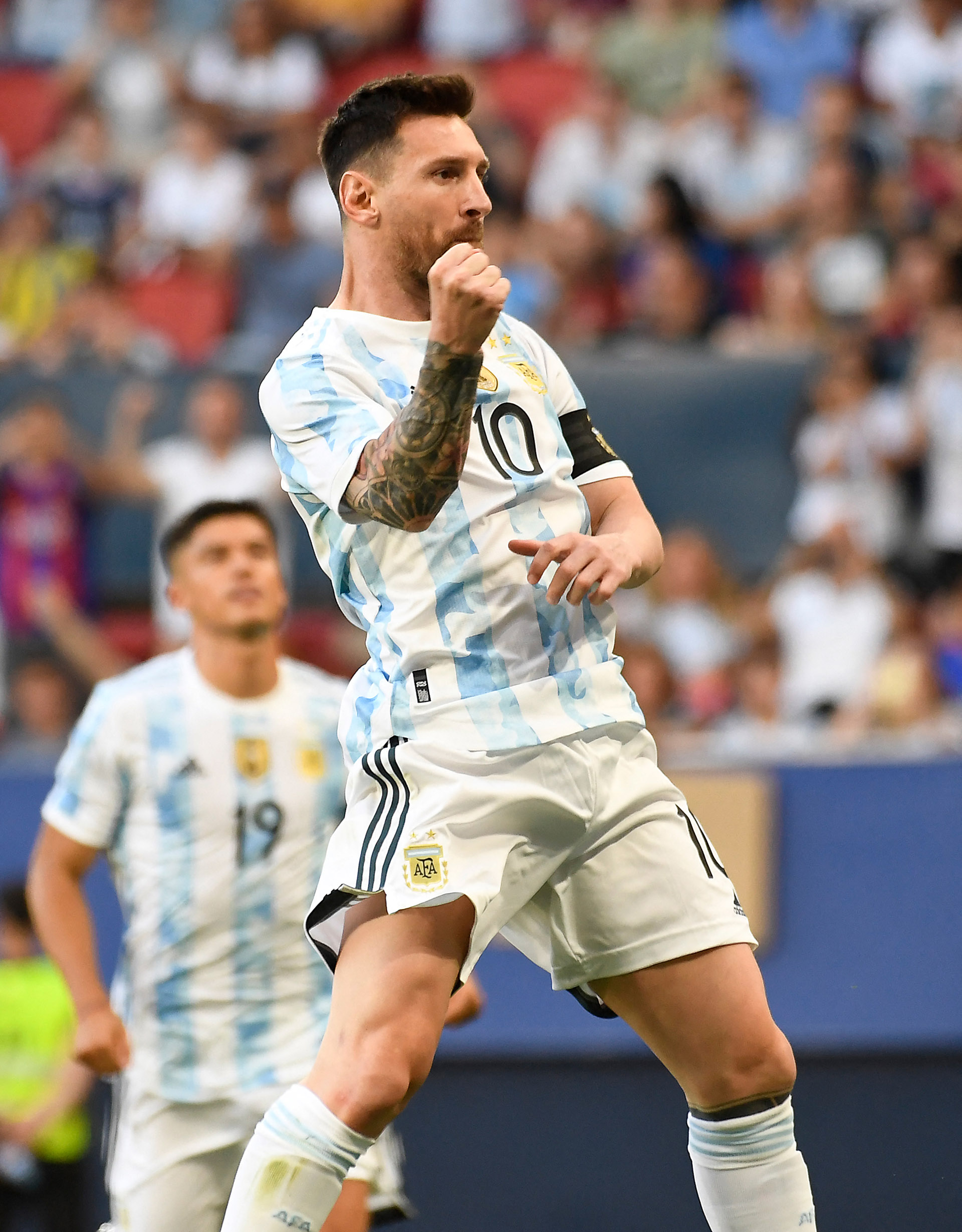 Argentine Lionel Messi celebrates after scoring his team's first goal during the international friendly soccer match between Argentina and Estonia at El Sadar Stadium in Pamplona on June 5, 2022 (Photo by ANDER Gillenea / AFP)