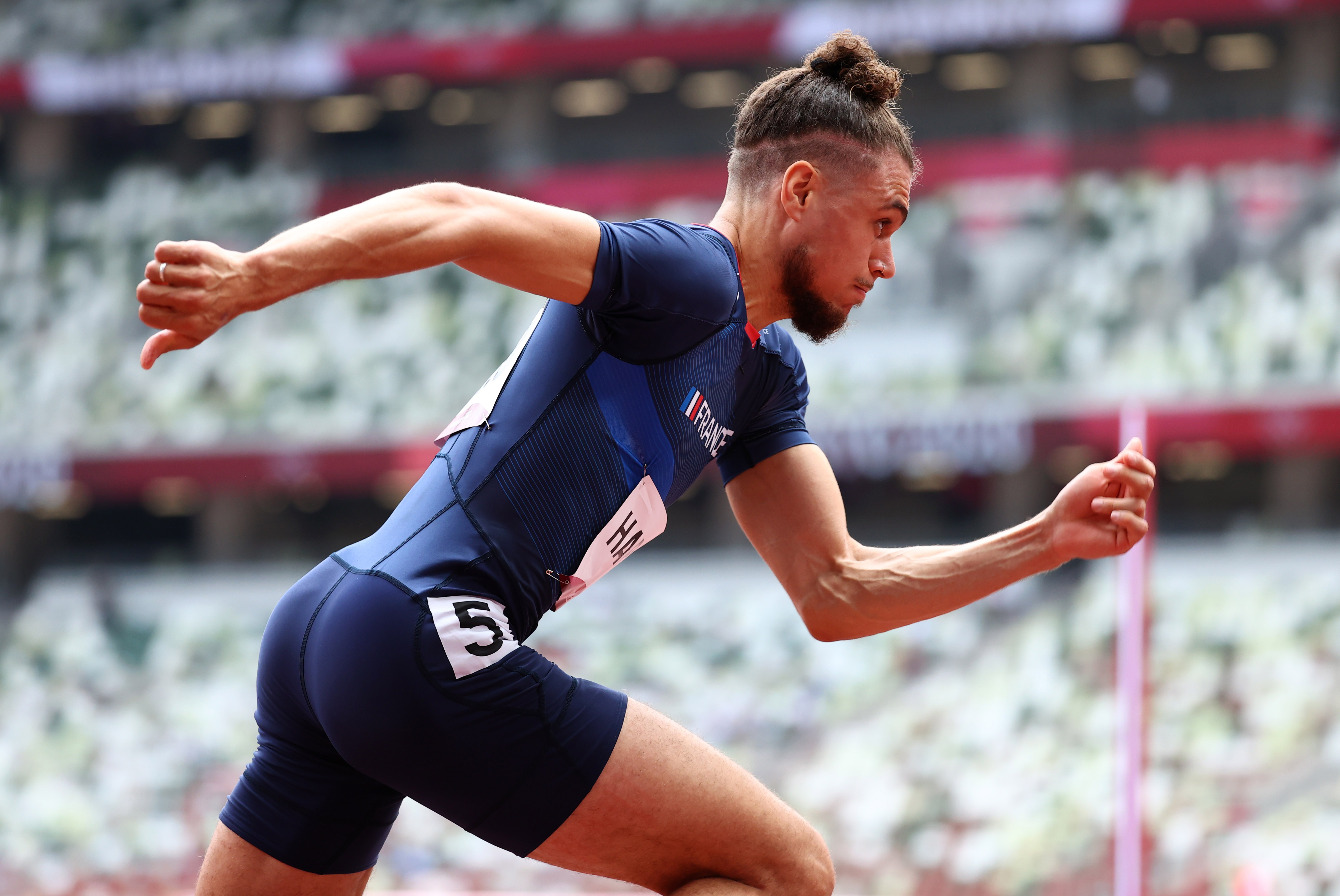 Tokyo 2020 Olympics - Athletics - Men's 400m Hurdles - Round 1 - OLS - Olympic Stadium, Tokyo, Japan - July 30, 2021. Wilfried Happio of France in action REUTERS/Lucy Nicholson