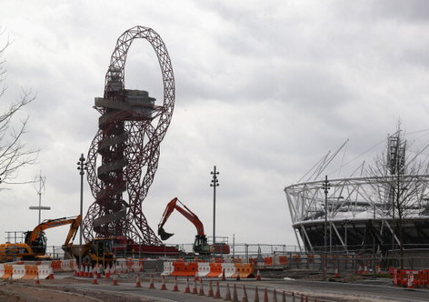 LONDON, ENGLAND - APRIL 16:  Redevelopment work takes place around the ArcelorMittal Orbit on the site of London 2012 Olympic Games prior to the opening of a portion of the park to the general public on April 16, 2013 in London, England. In 100 days the first section of the developed site of the 2012 Olympic Games, which will be known as Queen Elizabeth Olympic Park, will welcome visitors. The park's 292 million GBP conversion includes the removal of temporary venues, the refitting of stadia for public use, the removal of Olympic Games sponsor's retail units and extensive landscaping. The re-opening of the northern portion of the park will take place on July 27, 2013, on first anniversary of the London 2012 Olympics, for a festival celebrating the culture of East London. The park will be fully open to the public in spring 2014.  (Photo by Oli Scarff/Getty Images)