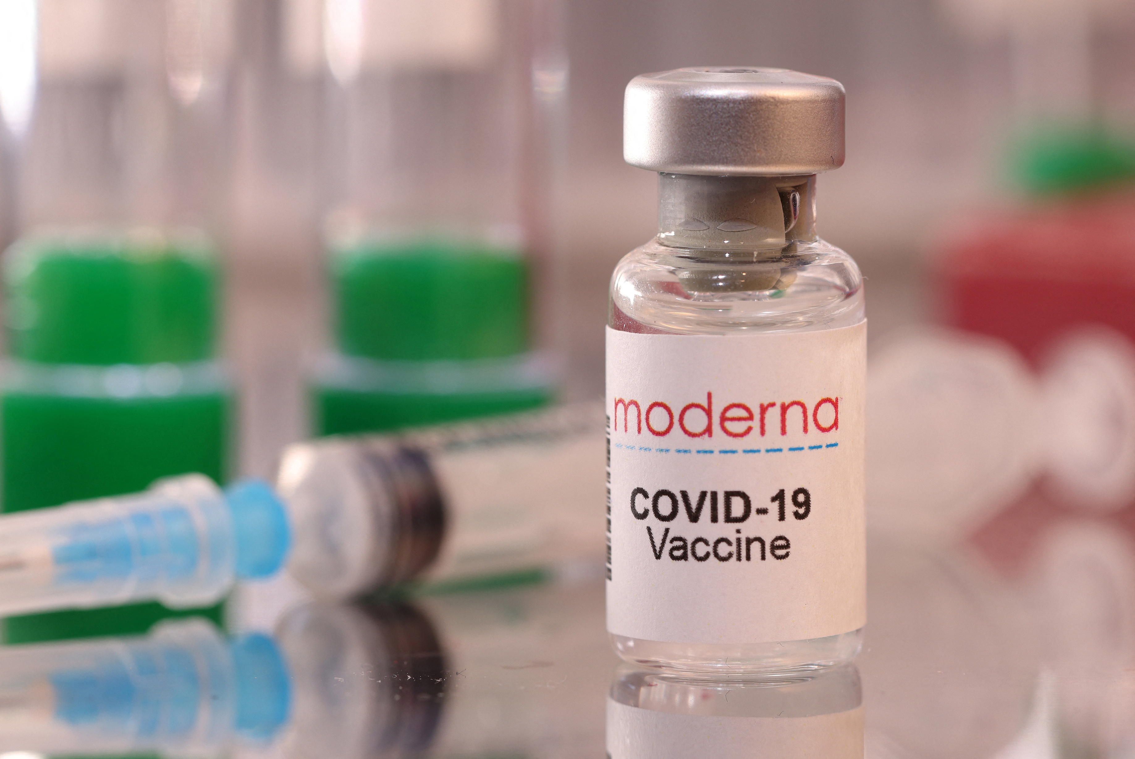 A vial labelled "Moderna COVID-19 Vaccine" is seen in this illustration taken January 16, 2022. REUTERS/Dado Ruvic/Illustration