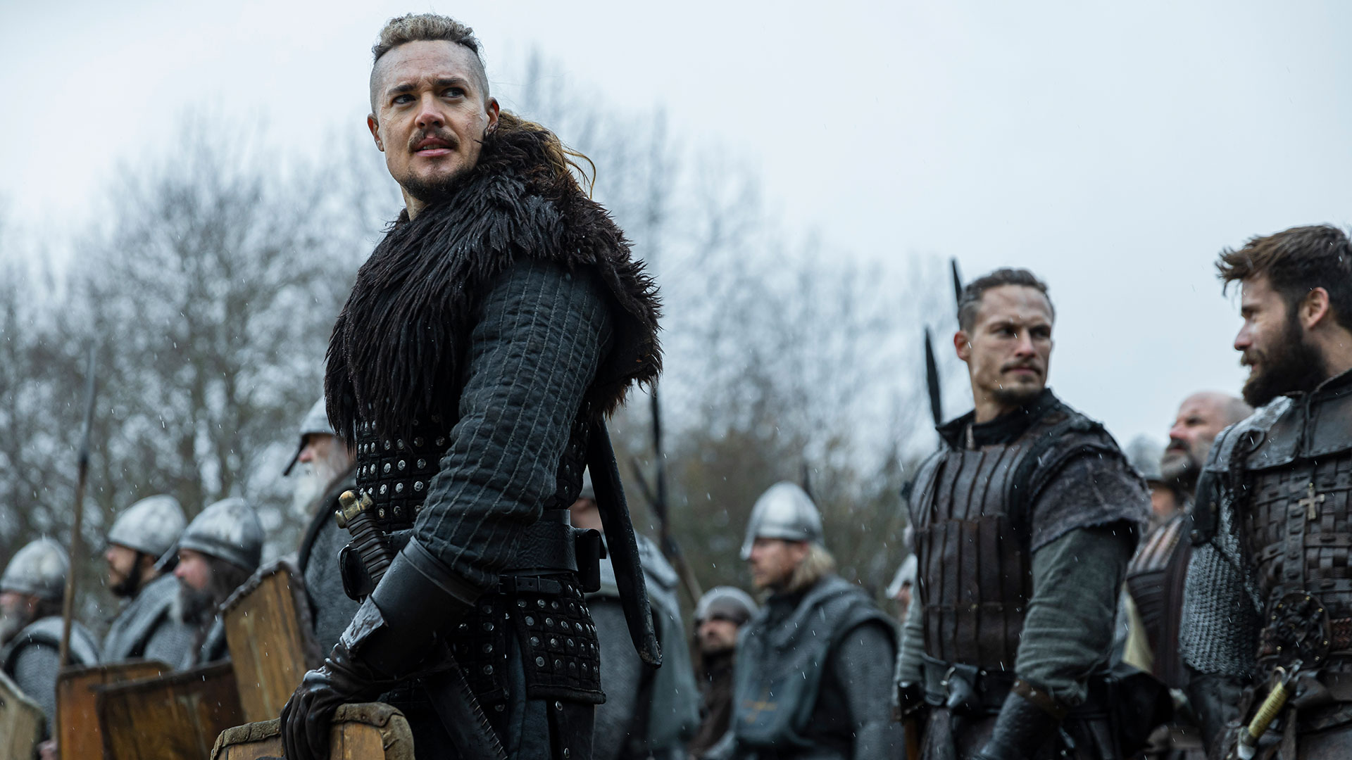 The Last Kingdom: Seven Kings Must Die. (L to R) Alexander Dreymon as Uhtred, Arnas Fedaravicius as Sihtric and Mark Rowley as Finan in The Last Kingdom: Seven Kings Must Die. Cr. Courtesy of Netflix © 2023