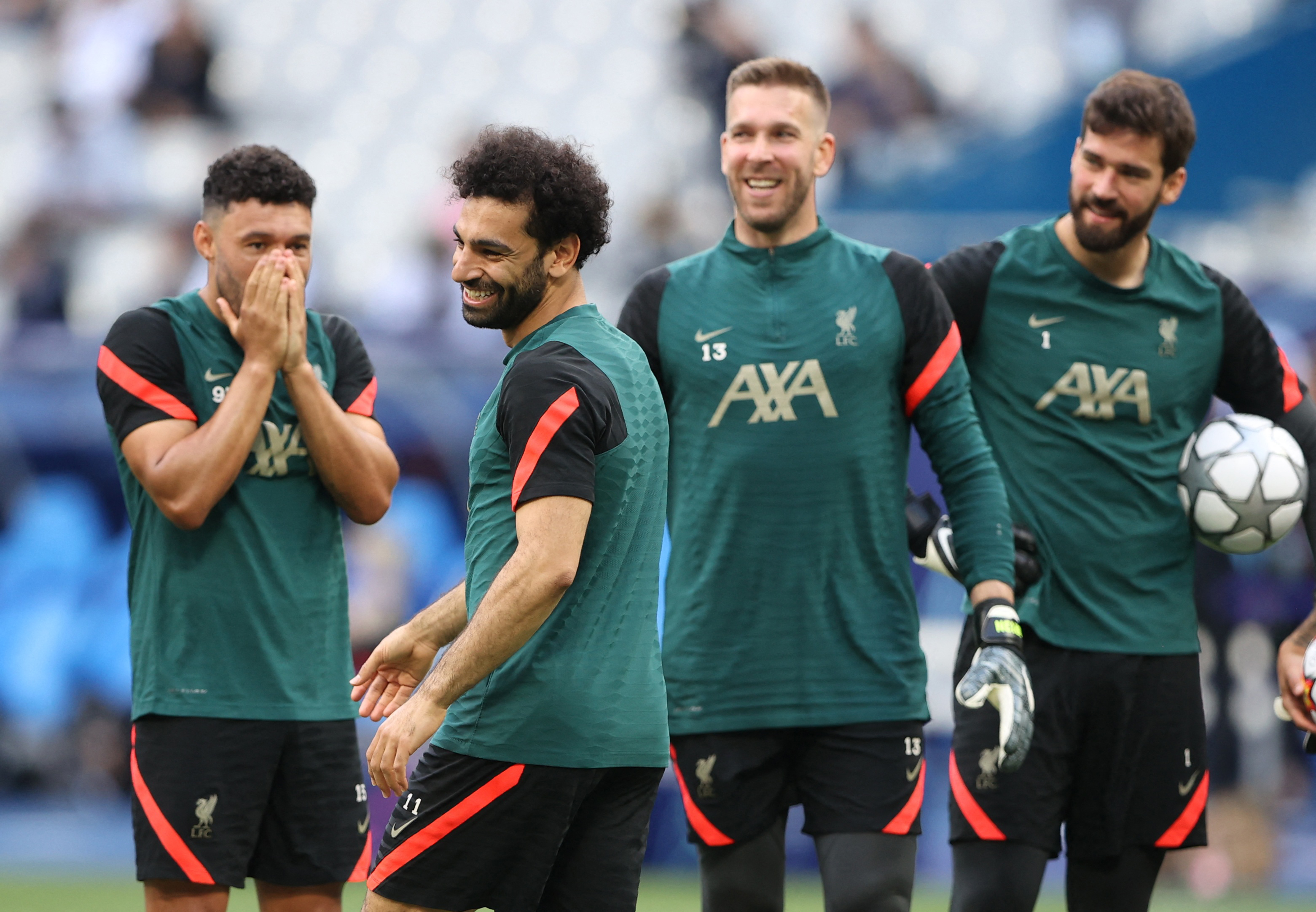 Soccer Football - Champions League Final - Liverpool Training - Stade de France, Saint-Denis near Paris, France - May 27, 2022 Liverpool's Mohamed Salah, Alex Oxlade-Chamberlain, Adrian and Alisson during training REUTERS/Molly Darlington