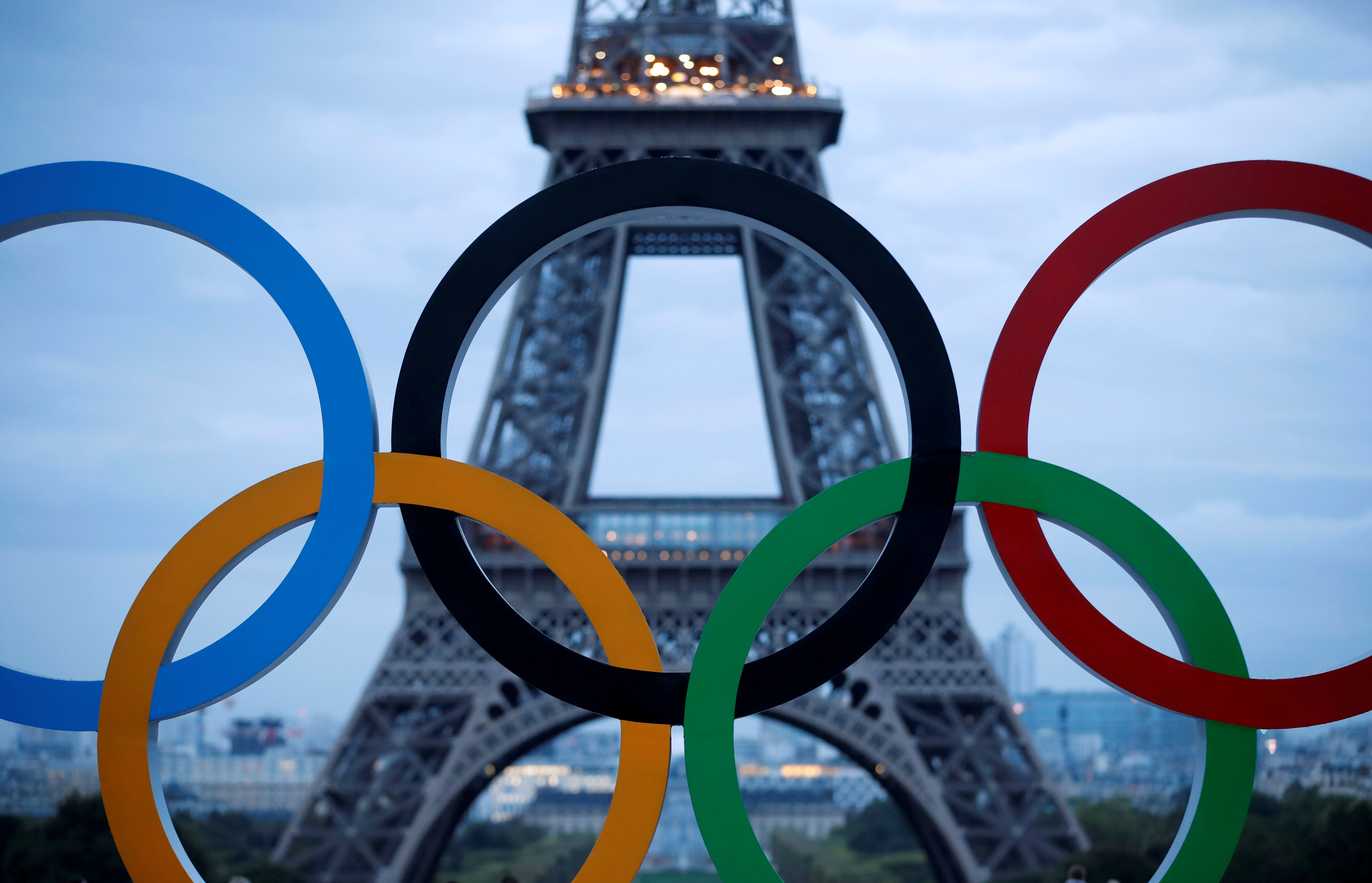 FILE PHOTO: Olympic rings to celebrate the IOC official announcement that Paris won the 2024 Olympic bid are seen in front of the Eiffel Tower at the Trocadero square in Paris, France, September 14, 2017.   REUTERS/Christian Hartmann/File Photo