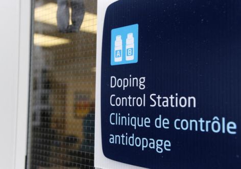 A sign shows the way to the doping control station at the Pacific ColIseum ice-skating rink of the Vancouver 2010 Winter Olympicson February 8, 2010. As the clock ticks down towards the 2010 Vancouver Olympics, doubts are being raised over the International Olympic Committee's (IOC) promise to wage a pitiless war against the drugs cheats. Designed to avoid the kind of scandal that marred the last two editions, tests will aim to detect performance enhancers like insulin and growth hormones, among others.  AFP PHOTO DDP / DAVID HECKER (Photo credit should read DAVID HECKER/AFP/Getty Images)