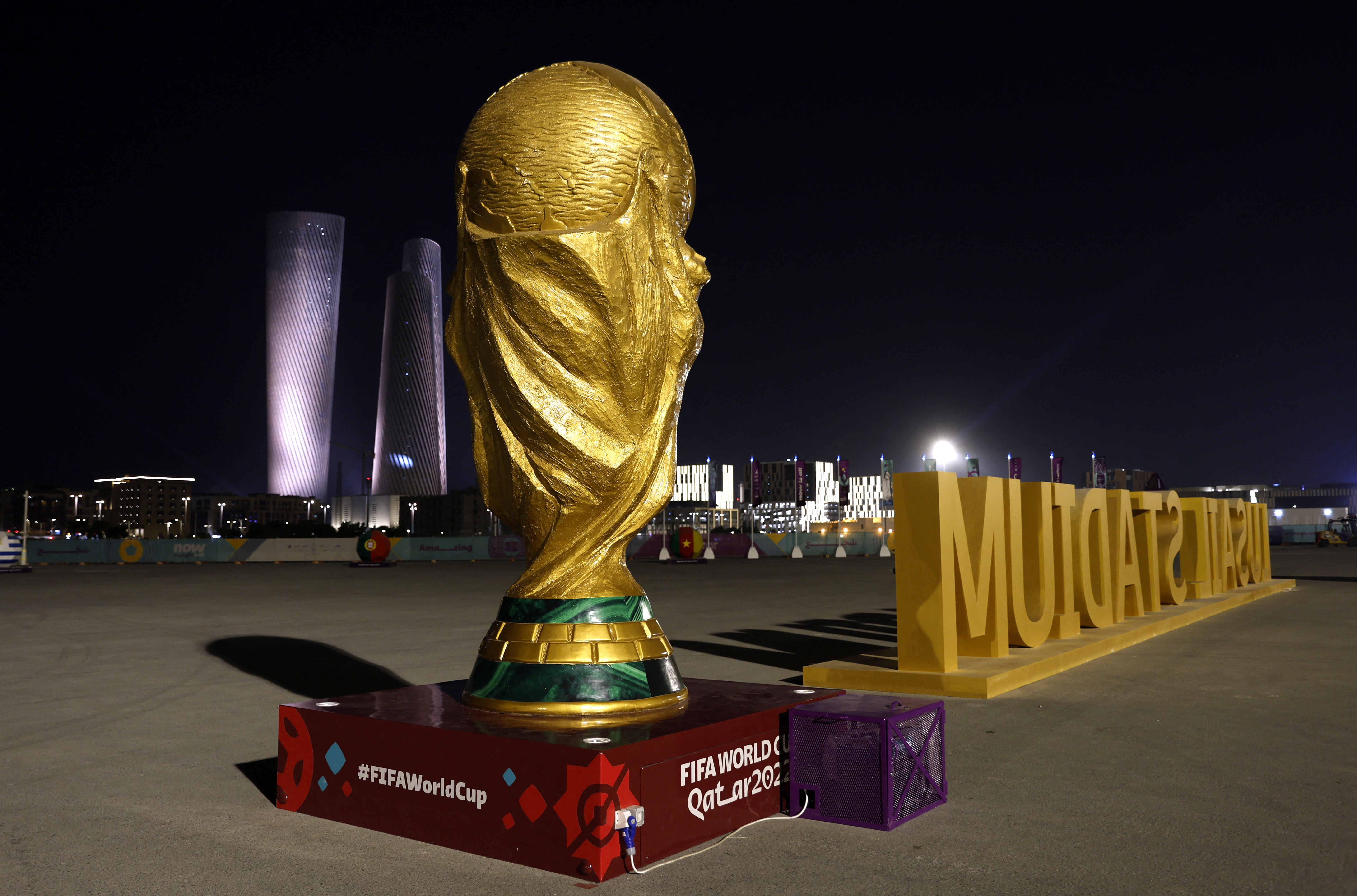 Soccer Football - FIFA World Cup Qatar 2022 Preview - Lusail, Qatar - November 7, 2022 General view of a replica World Cup trophy outside of Lusail Stadium REUTERS/Suhaib Salem