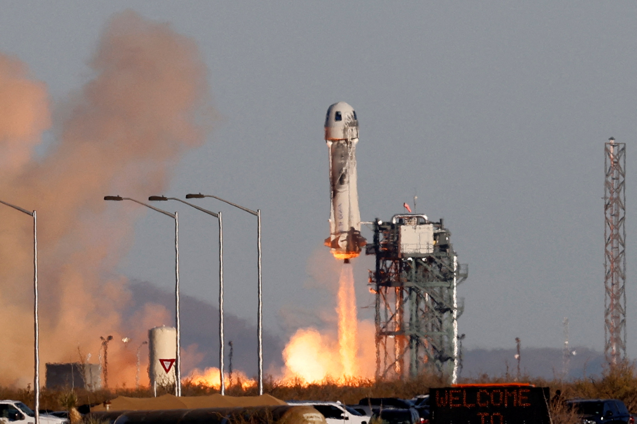 FILE PHOTO: A Blue Origin New Shepard rocket lifts off with a crew of six, including Laura Shepard Churchley, the daughter of the first American in space Alan Shepard, for whom the spacecraft is named, from Launch Site One in west Texas, U.S. December 11, 2021. REUTERS/Joe Skipper/File Photo