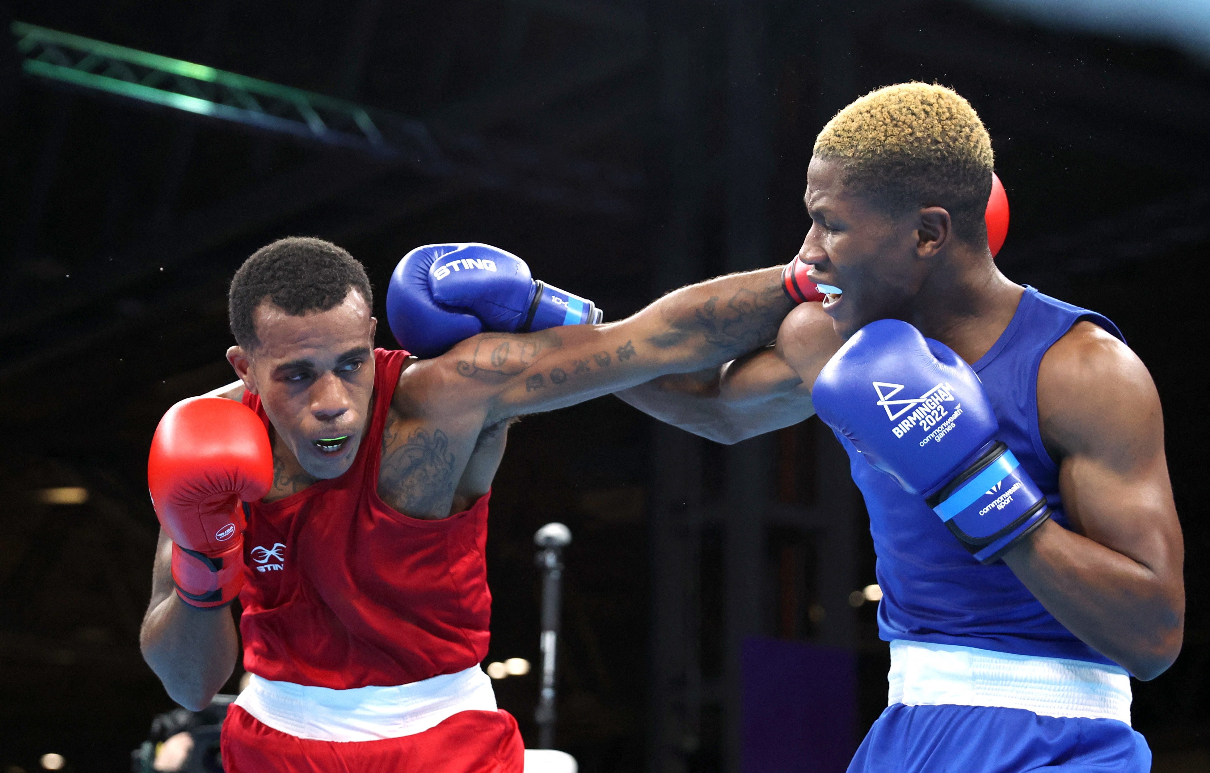 Commonwealth Games - Boxing - Men’s Over 60kg-63.5kg Light Welter - Round of 16 - The NEC Hall 4, Birmingham, Britain - July 31, 2022 Bahamas' Rashield Williams in action during his round of 16 fight with Namibia's Jonas Junias Jonas REUTERS/Phil Noble