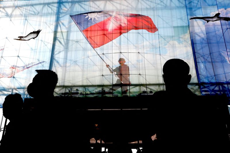 FILE PHOTO: Taiwanese flags at the Taiwan Ministry of National Defense in Taipei, Taiwan, Dec. 26, 2022. REUTERS/Ann Wang