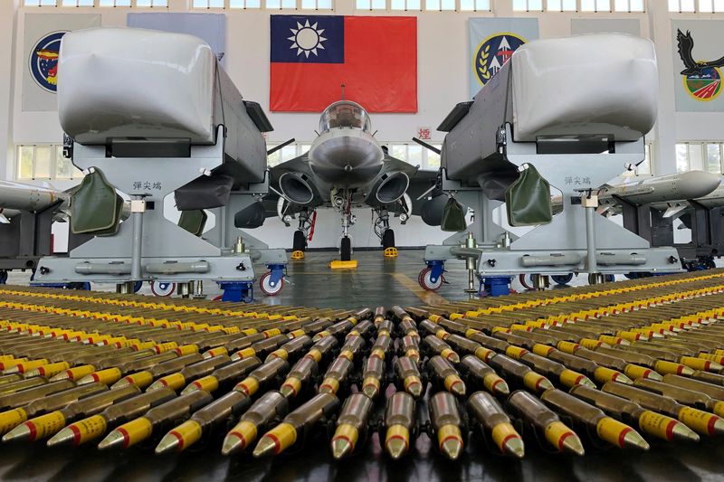 FILE PHOTO: An Indigenous Defense Force (IDF) fighter jet and Wan Chien air-to-ground cruise missiles at the Makung Air Force Base on Penghu island, off the coast of Taiwan, September 22, 2020. REUTERS/File Photo yimou lee