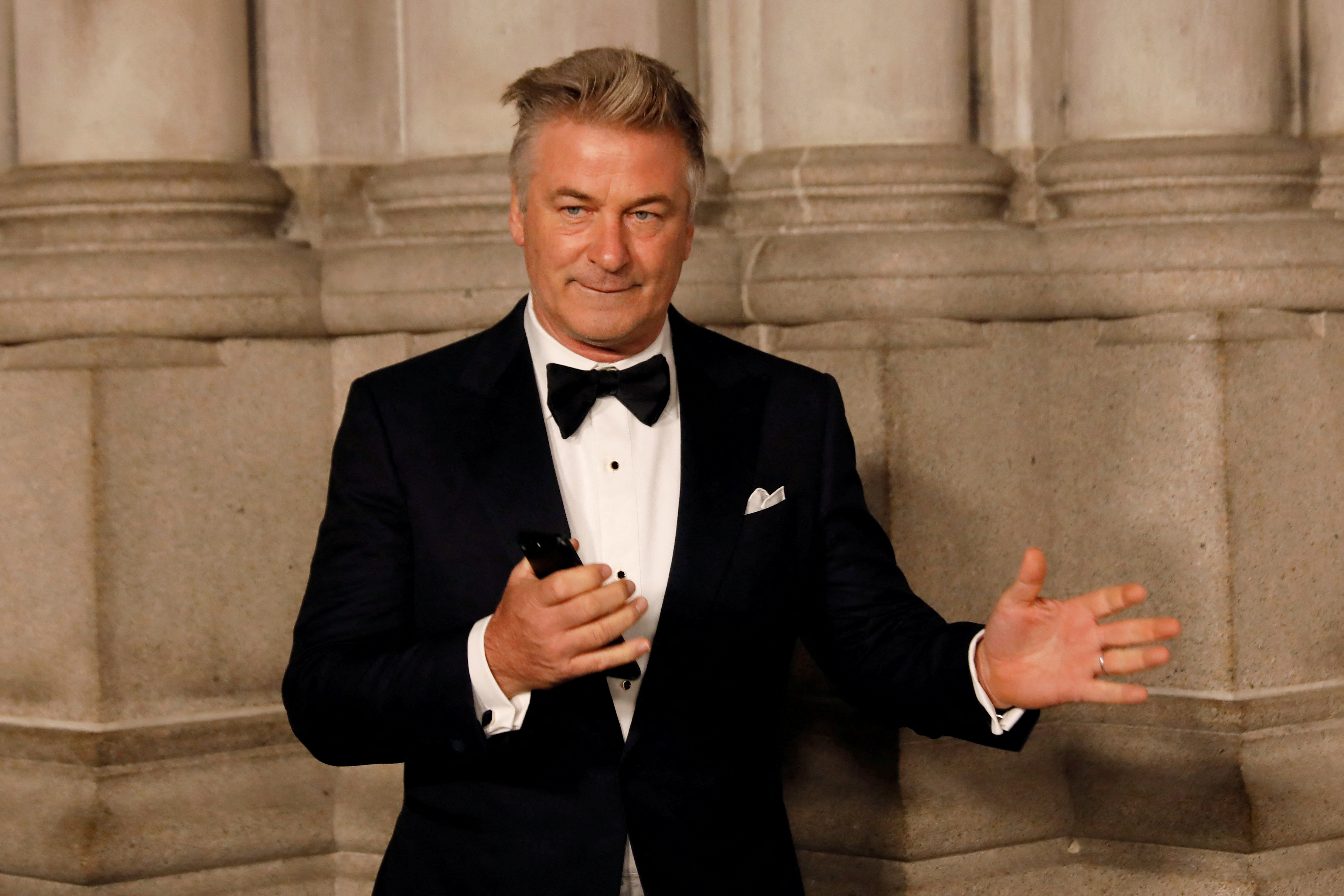 FILE PHOTO: Actor Alec Baldwin gestures before walking on the red carpet during the commemoration of the Elton John AIDS Foundation 25th year fall gala at the Cathedral of St. John the Divine in New York City, in New York, U.S. November 7, 2017. REUTERS/Shannon Stapleton/File Photo