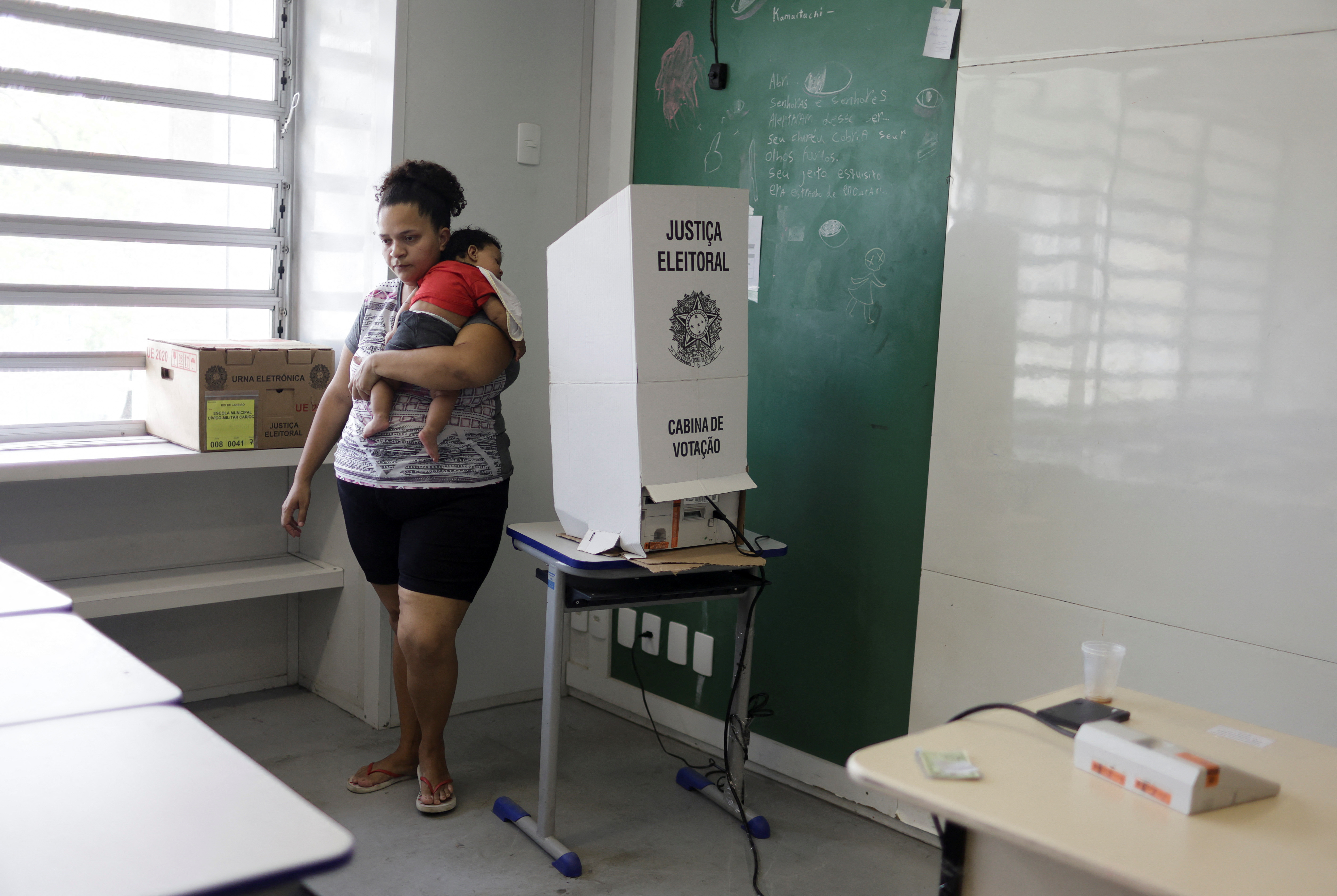 Bolsonaro y Lula se enfrentan en el ballotage de este domingo (REUTERS/Pilar Olivares)