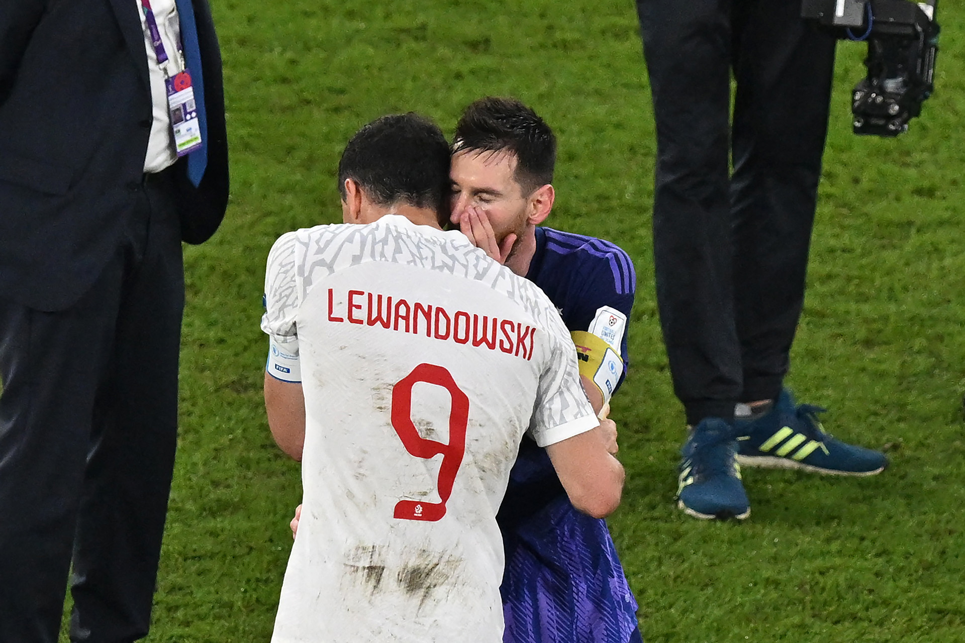 Poland's forward #09 Robert Lewandowski (L) and Argentina's forward #10 Lionel Messi greet each other at the end of the Qatar 2022 World Cup Group C football match between Poland and Argentina at Stadium 974 in Doha on November 30, 2022. (Photo by Glyn KIRK / AFP)
