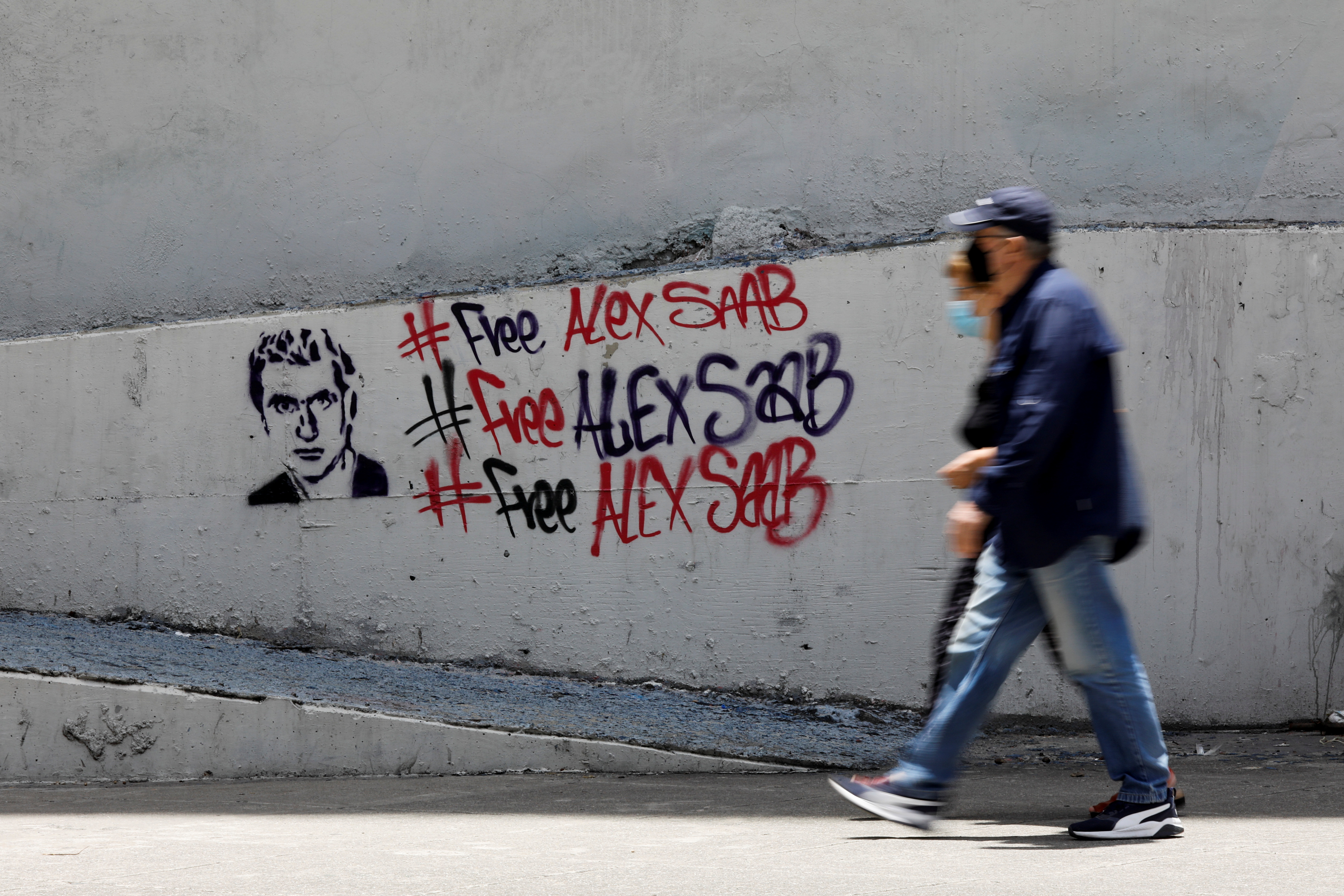 Un grafiti en apoyo a la liberación de Alex Saab en Caracas, Venezuela el 9 de septiembre de 2021. REUTERS / Leonardo Fernandez Viloria
