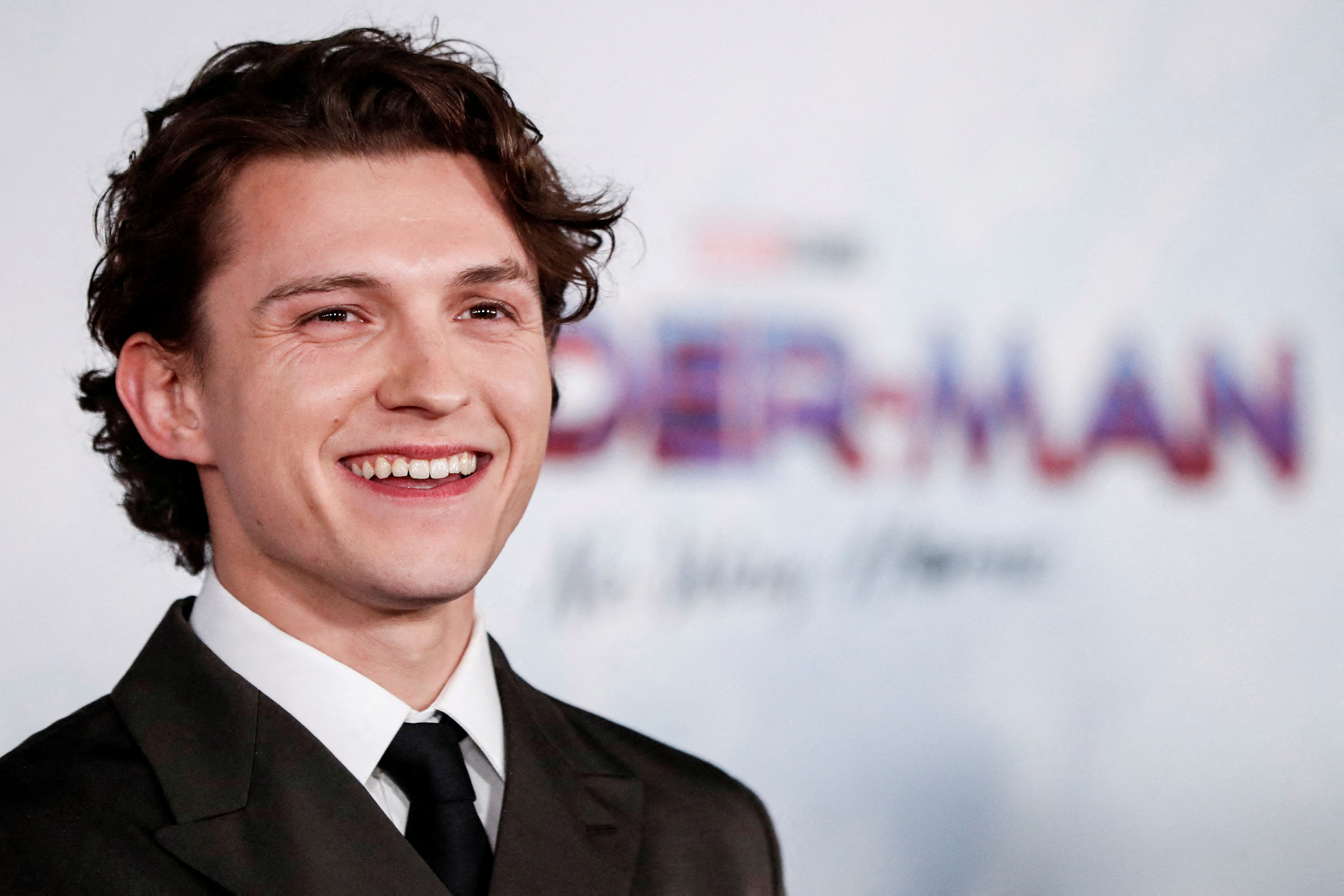 FILE PHOTO: Cast member Tom Holland attends the premiere for the film Spider-Man: No Way Home in Los Angeles, California, December 13, 2021. REUTERS/Mario Anzuoni/File Photo