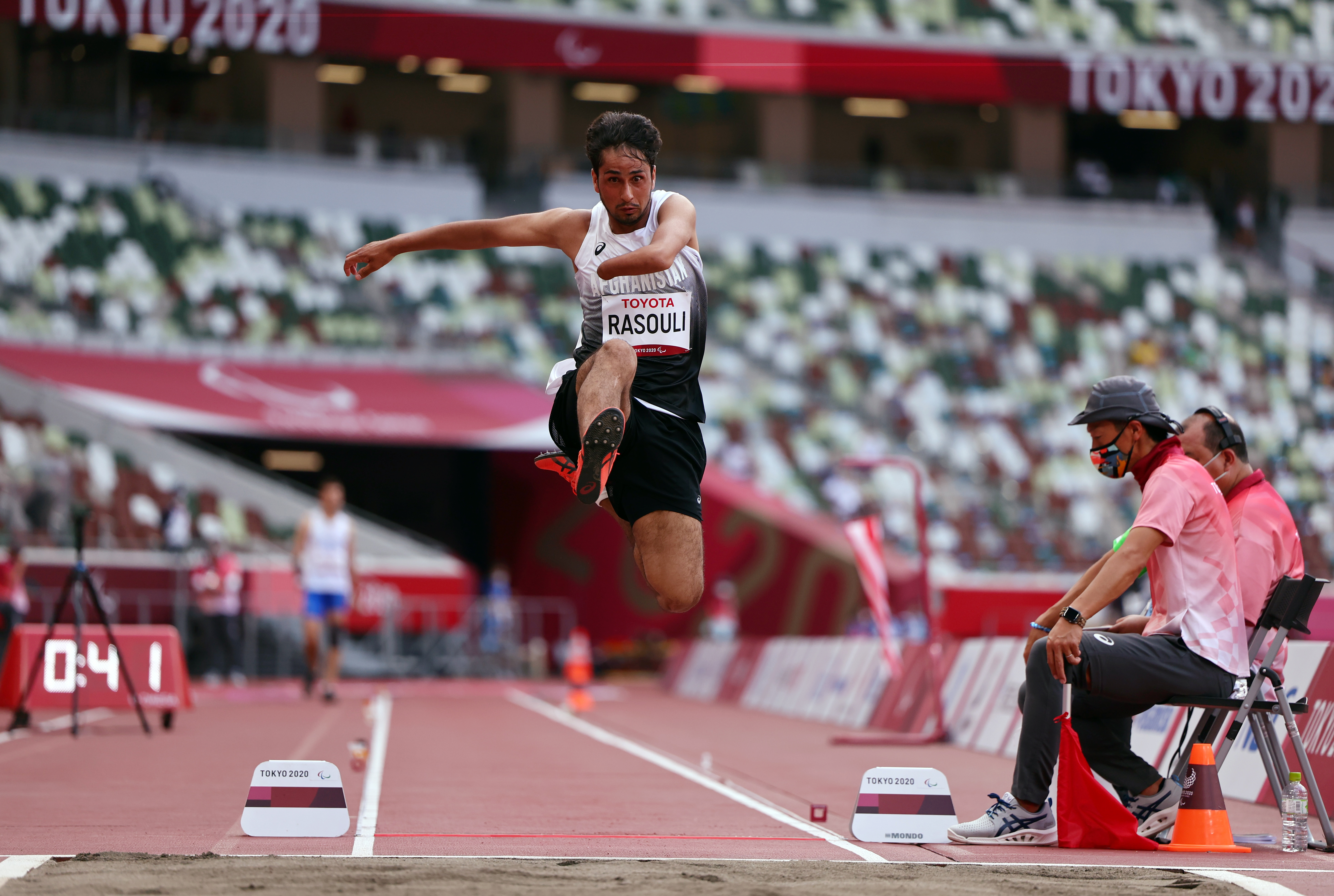 Tokyo 2020 Paralympic Games - Athletics - Men's Long Jump - T47 Final - Olympic Stadium, Tokyo, Japan - August 31, 2021. Hossain Rasouli of Afghanistan in action REUTERS/Athit Perawongmetha