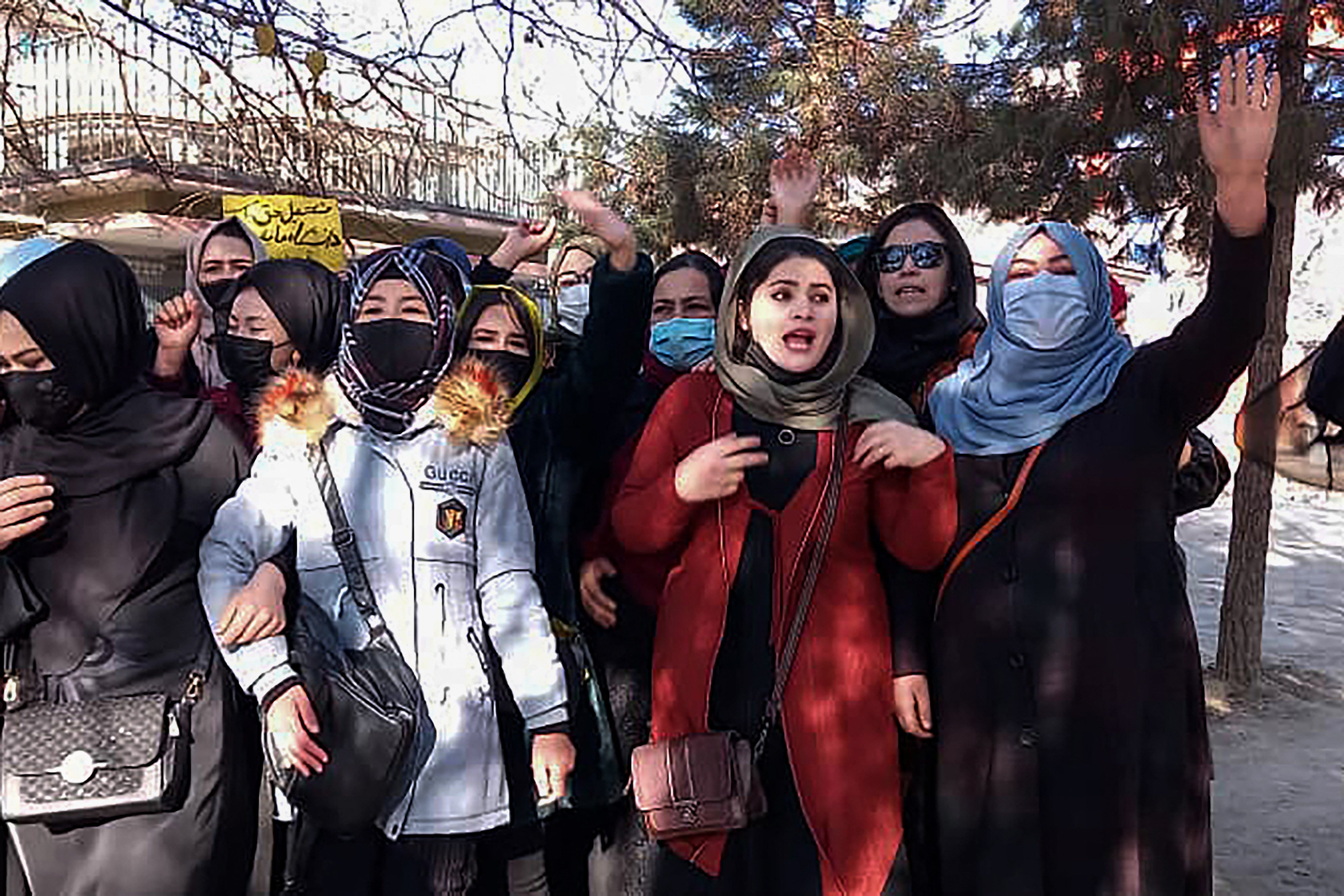 Afghan women chant slogans in protest against the ban on university education for women in Kabul, on December 22, 2022 (AFP Photo)