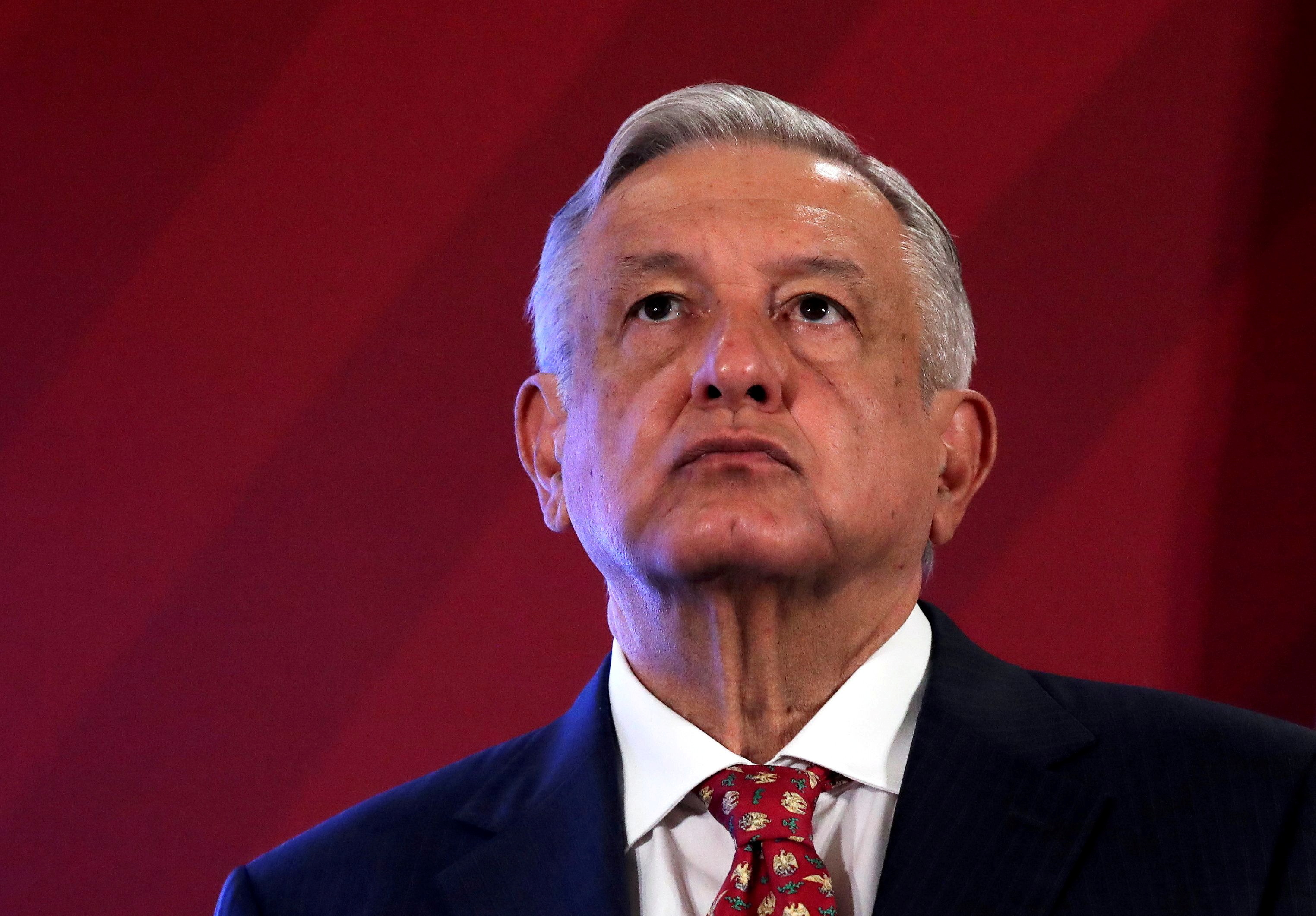 FILE PHOTO: Mexico's President Andres Manuel Lopez Obrador looks up during a news conference at the National Palace in Mexico City, Mexico June 30, 2020. Picture taken June 30, 2020. REUTERS/Henry Romero/File Photo