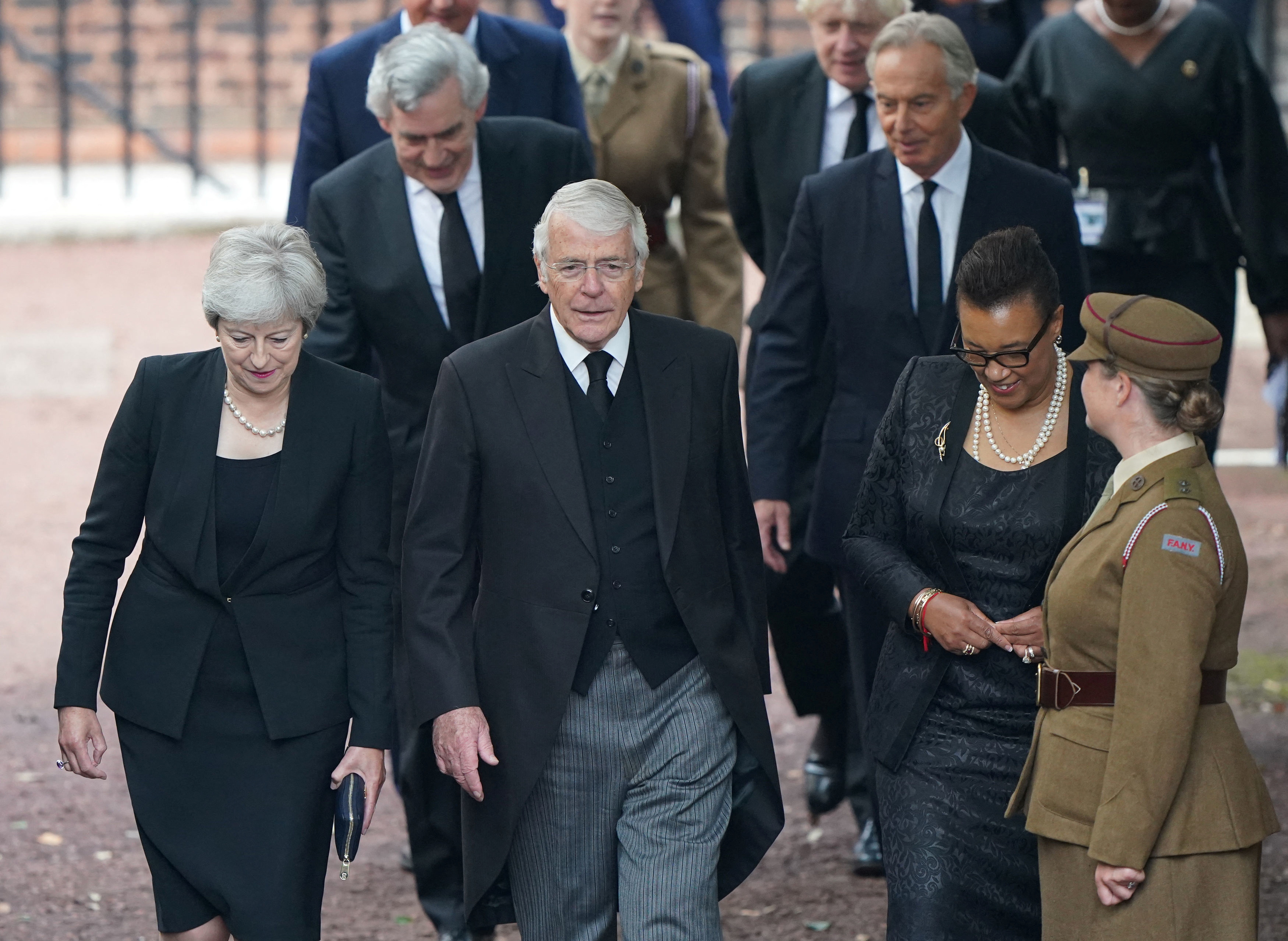 Former British Prime Ministers Theresa May, John Major, and Baroness Scotland arrive for the Accession Council ceremony at St James's Palace, where Britain's King Charles III will be proclaimed Britain's new monarch, following the death of Queen Elizabeth II, in London, Britain September 10, 2022.  Joe Giddens/Pool via REUTERS