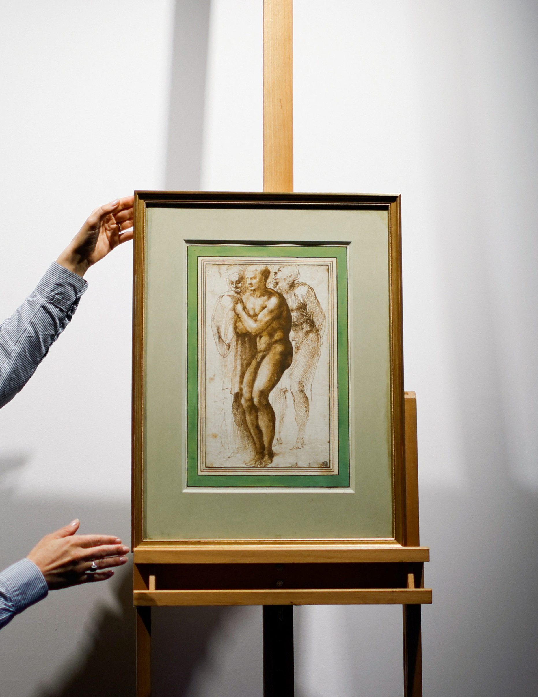 "Un joven desnudo (después de Masaccio) rodeado de dos figuras" de Michelangelo Buonarroti (1475-1564)