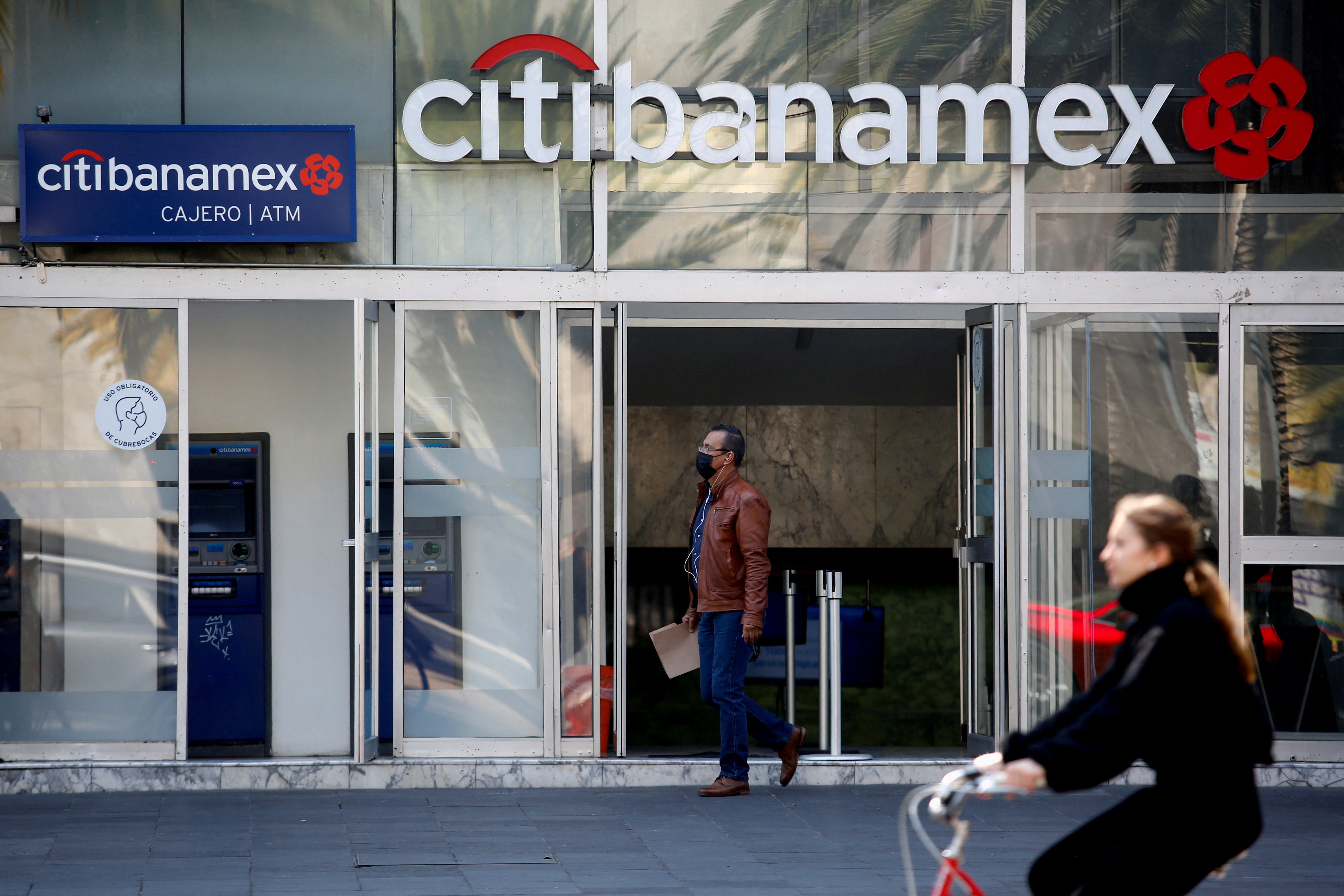 FILE PHOTO: A man exits a Citibanamex bank branch in Mexico City, Mexico January 13, 2022. REUTERS/Gustavo Graf/File Photo/File Photo