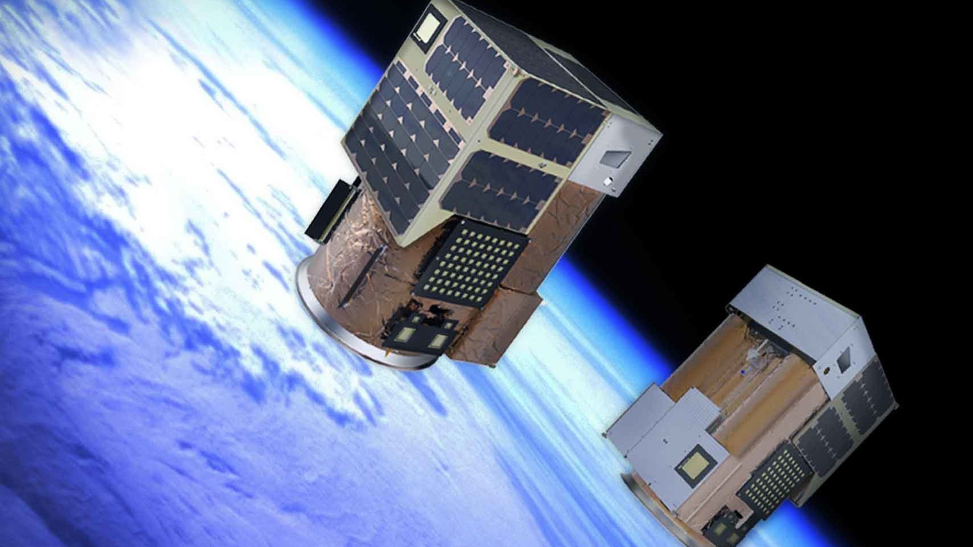Render de dos de los satélites de Satellogic en órbita