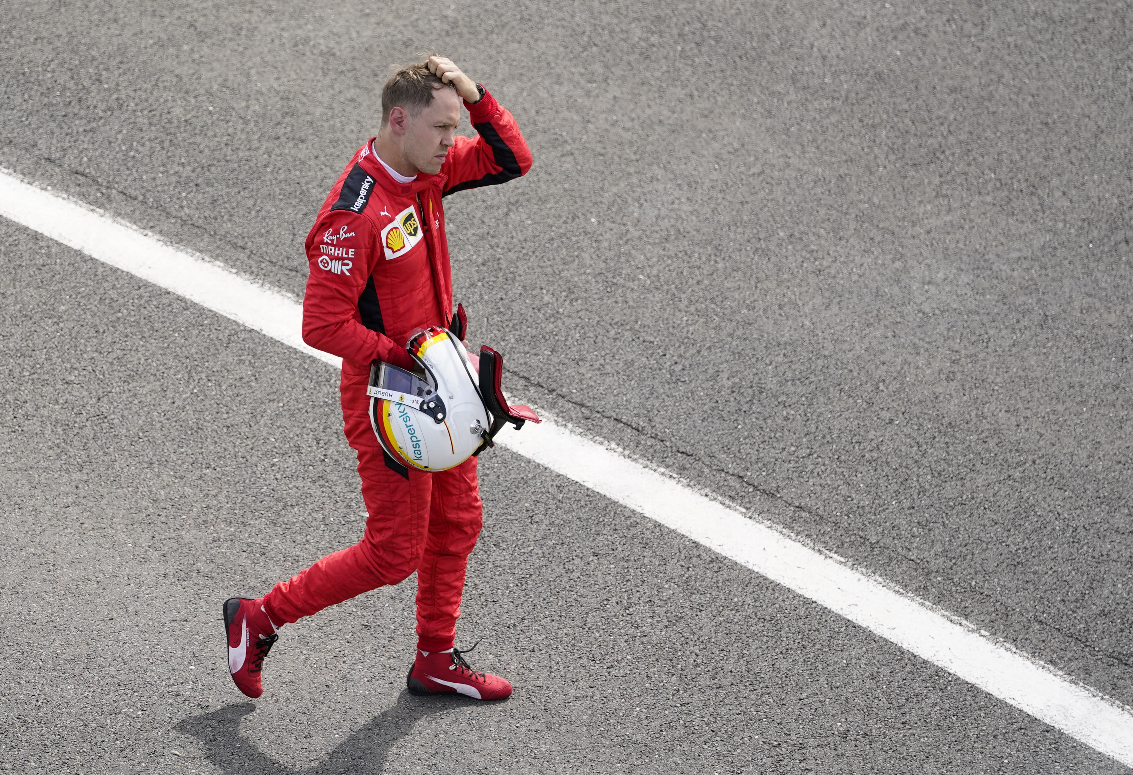 Vettel terminó décimo en el GP de Gran Bretaña - REUTERS/Will Oliver