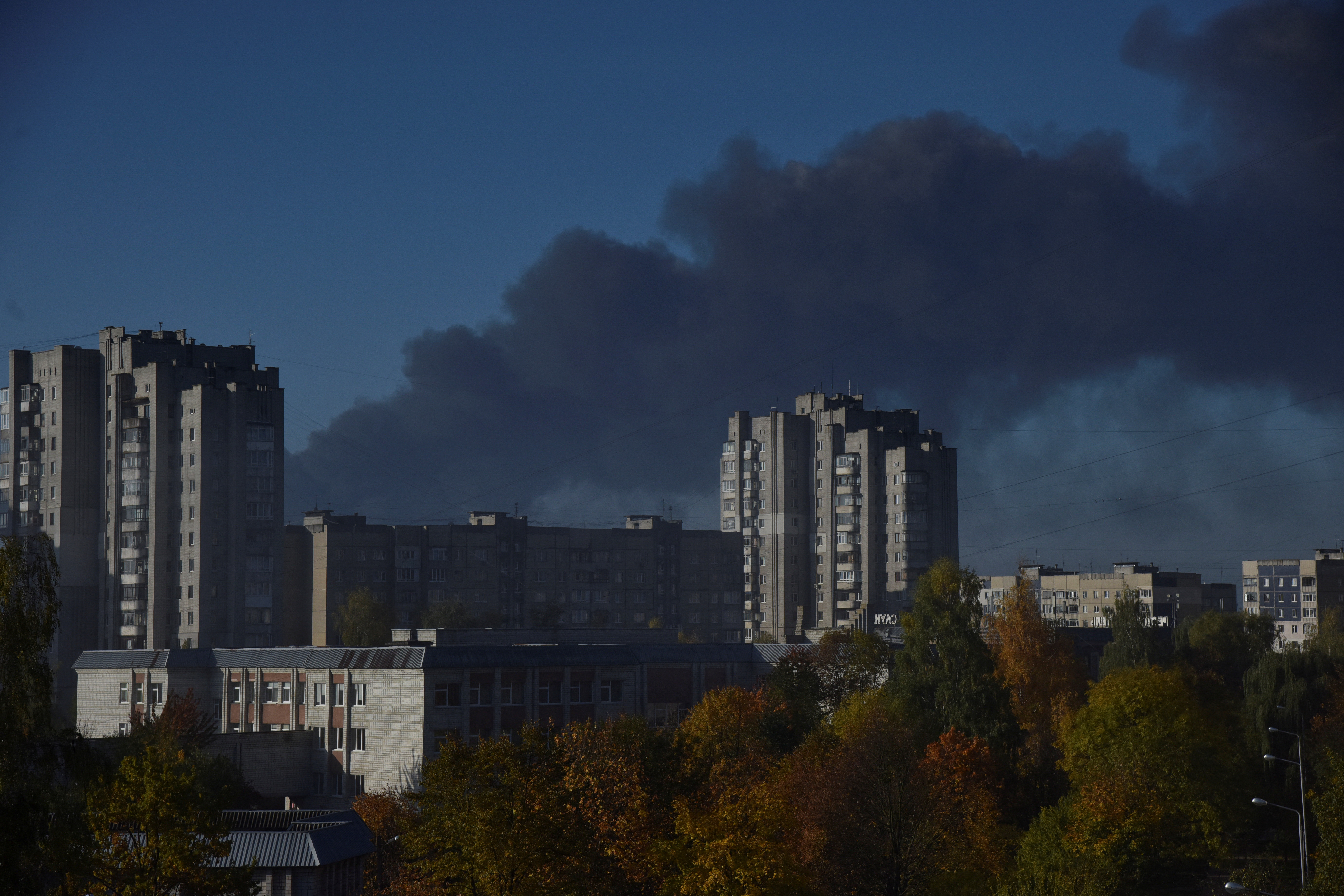 Columns of smoke are seen in the sky over Lviv after Russian airstrikes on Monday REUTERS/Pavlo Palamarchuk.