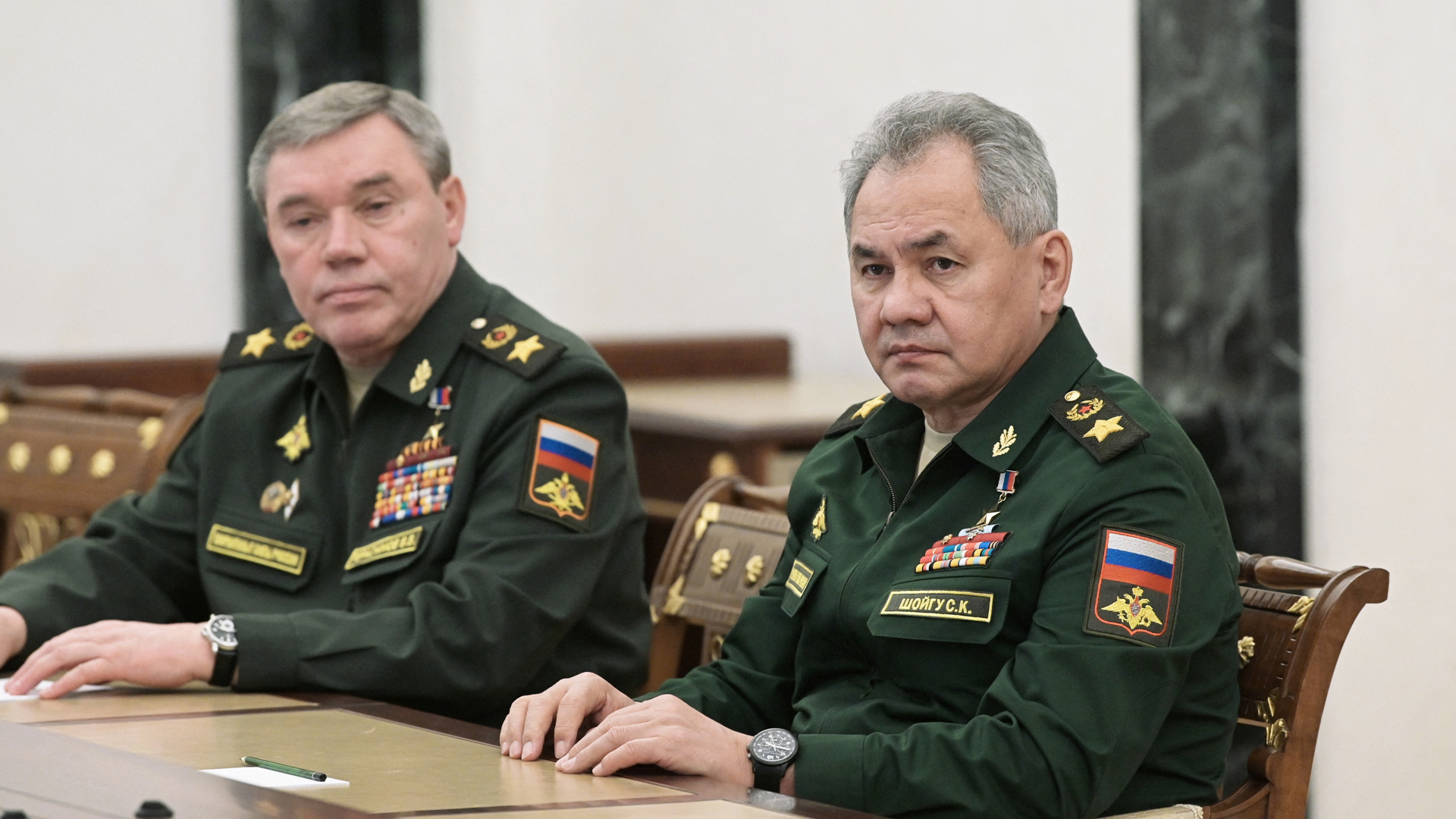 A theory developed by General Valery Gerasimov expands the scenario of armed conflict and calls it a gray zone.  He explains that this area involves more than war.  Its aims are social, economic, humanitarian and political.  General Gerasimov at left of photo (Reuters)