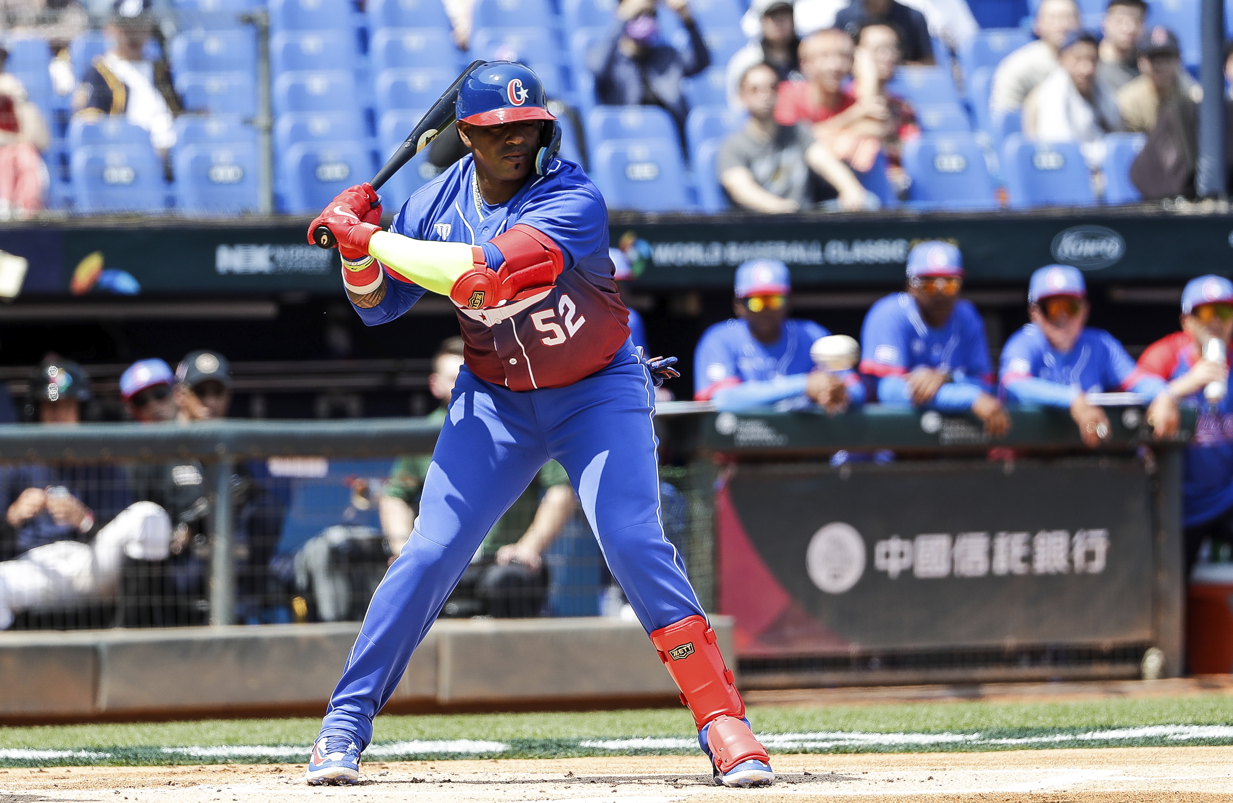 Cuban baseball player Yoenis Cespedes scores a hit during a group A game against the Netherlands during the World Baseball Classic at Taichung Intercontinental Stadium in Taichung, Taiwan, Wednesday, March 8, 2023. (AP Photo/I-Hwa Cheng)