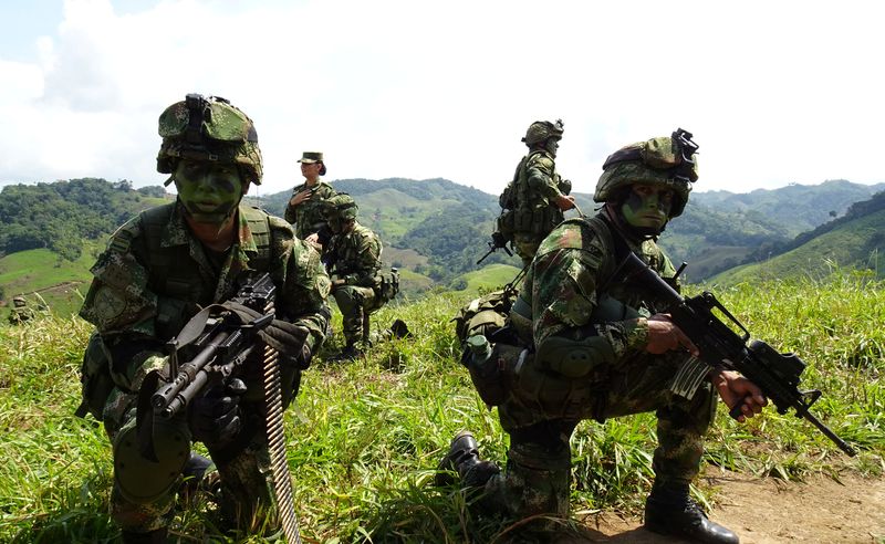 File photo.  Colombian Army soldiers take part in an operation to eradicate coca leaf crops in Tarazá, Antioquia department, Colombia, September 10, 2019. REUTERS/Luis Jaime Acosta