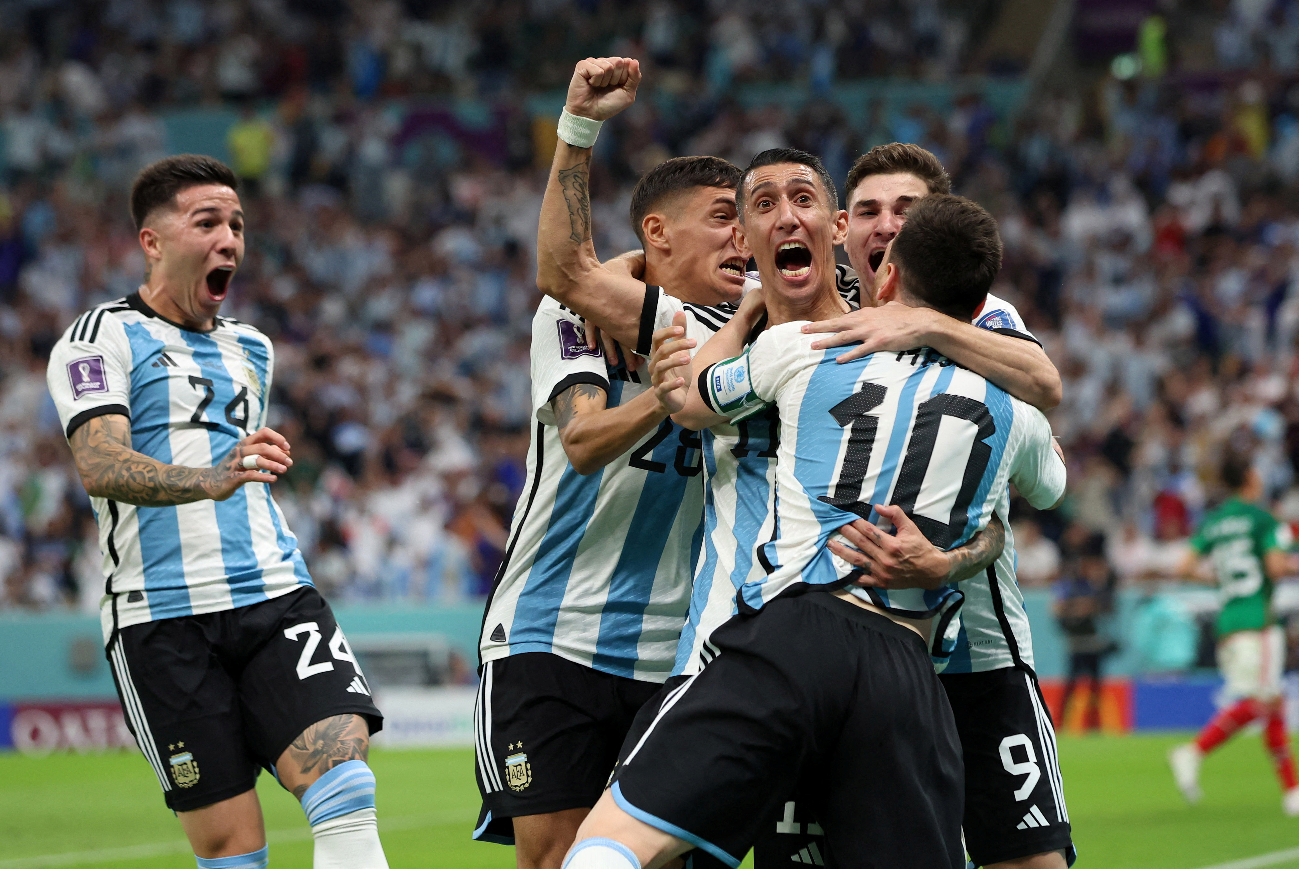 Soccer Football - FIFA World Cup Qatar 2022 - Group C - Argentina v Mexico - Lusail Stadium, Lusail, Qatar - November 26, 2022 Argentina's Lionel Messi celebrates scoring their first goal with Julian Alvarez, Angel Di Maria, Nahuel Molina and Enzo Fernandez REUTERS/Pedro Nunes     TPX IMAGES OF THE DAY