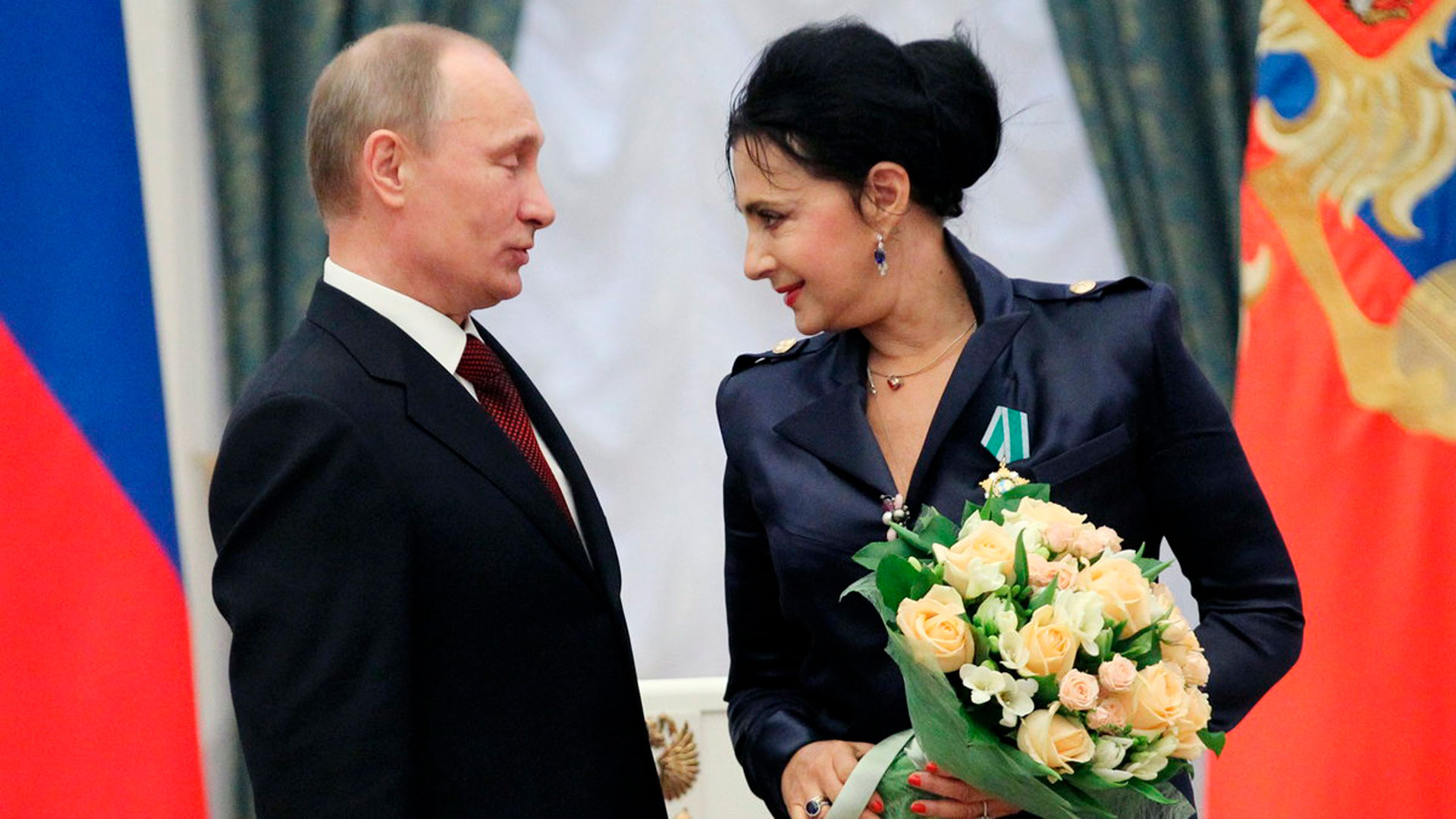 Irina Viner junto a Vladimir Putin en 2013