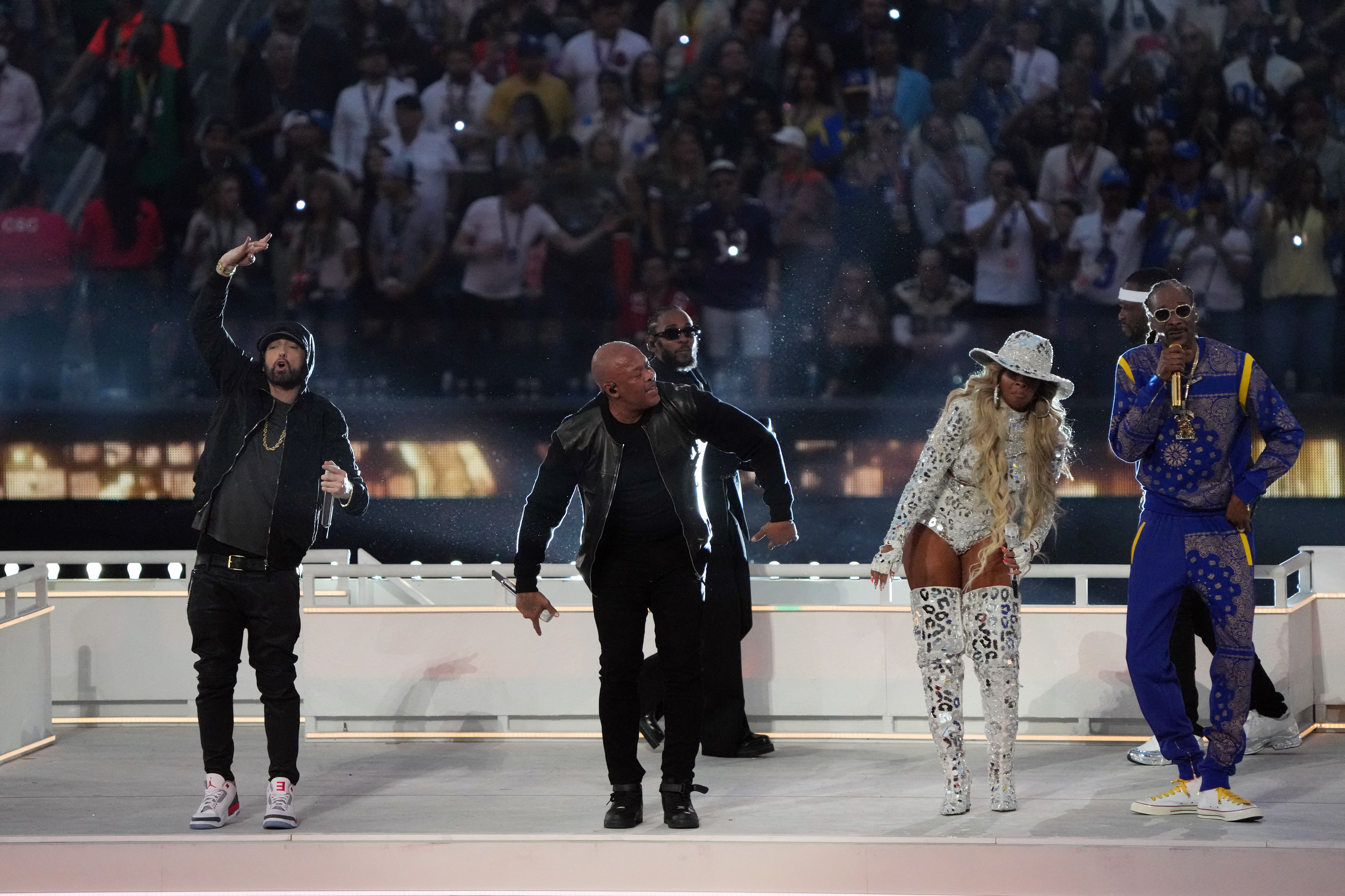 Feb 13, 2022; Inglewood, California, USA; Eminem, Kendrick Lamar, Dr. Dre, Mary J. Blige, 50 Cent, and Snoop Dogg perform at the halftime show during the game between the Los Angeles Rams and the Cincinnati Bengals in Super Bowl LVI at SoFi Stadium. Mandatory Credit: Kirby Lee-USA TODAY Sports