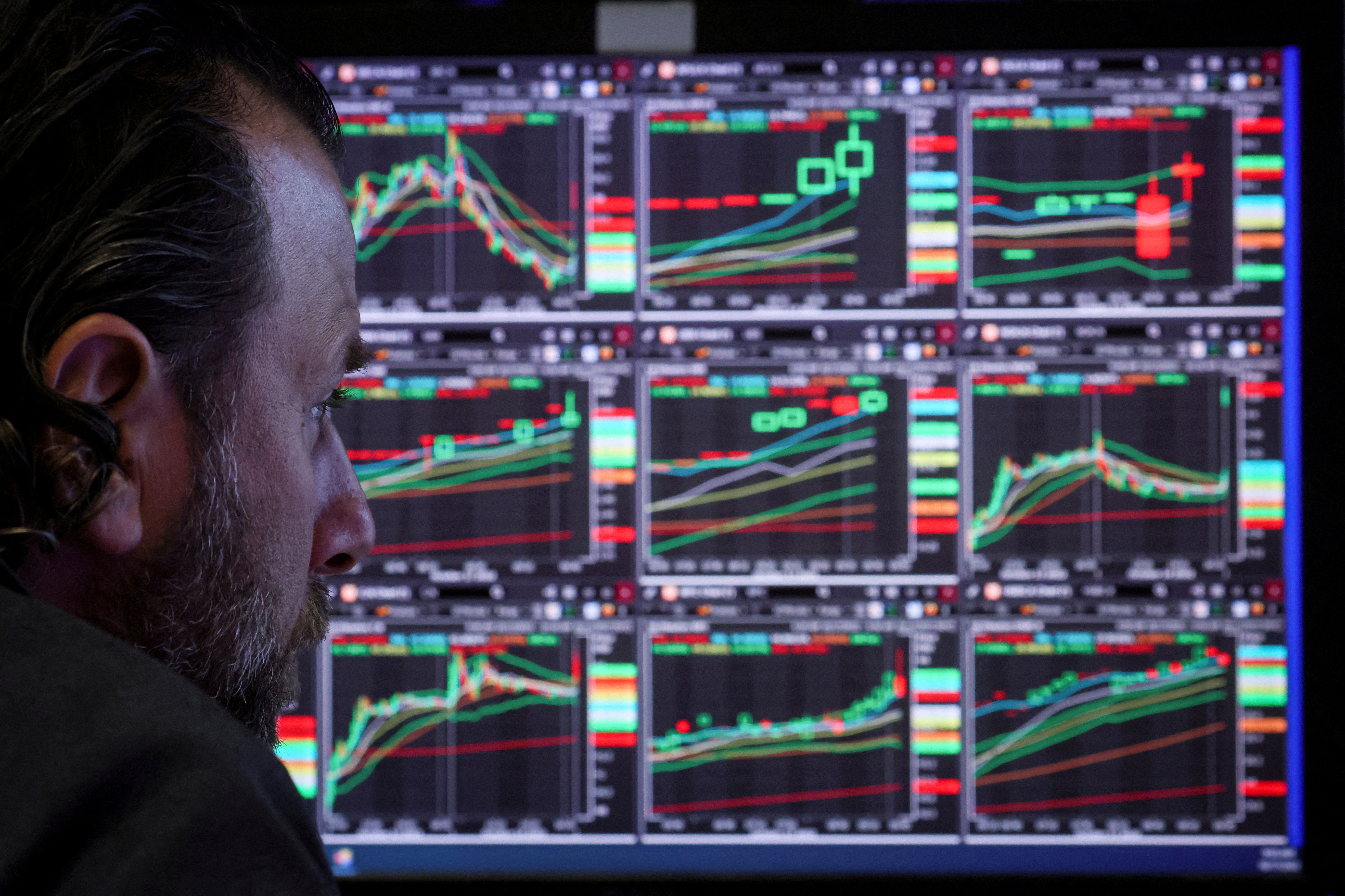 A stockbroker works on Wall Street (REUTERS / Brendan McDermid)
