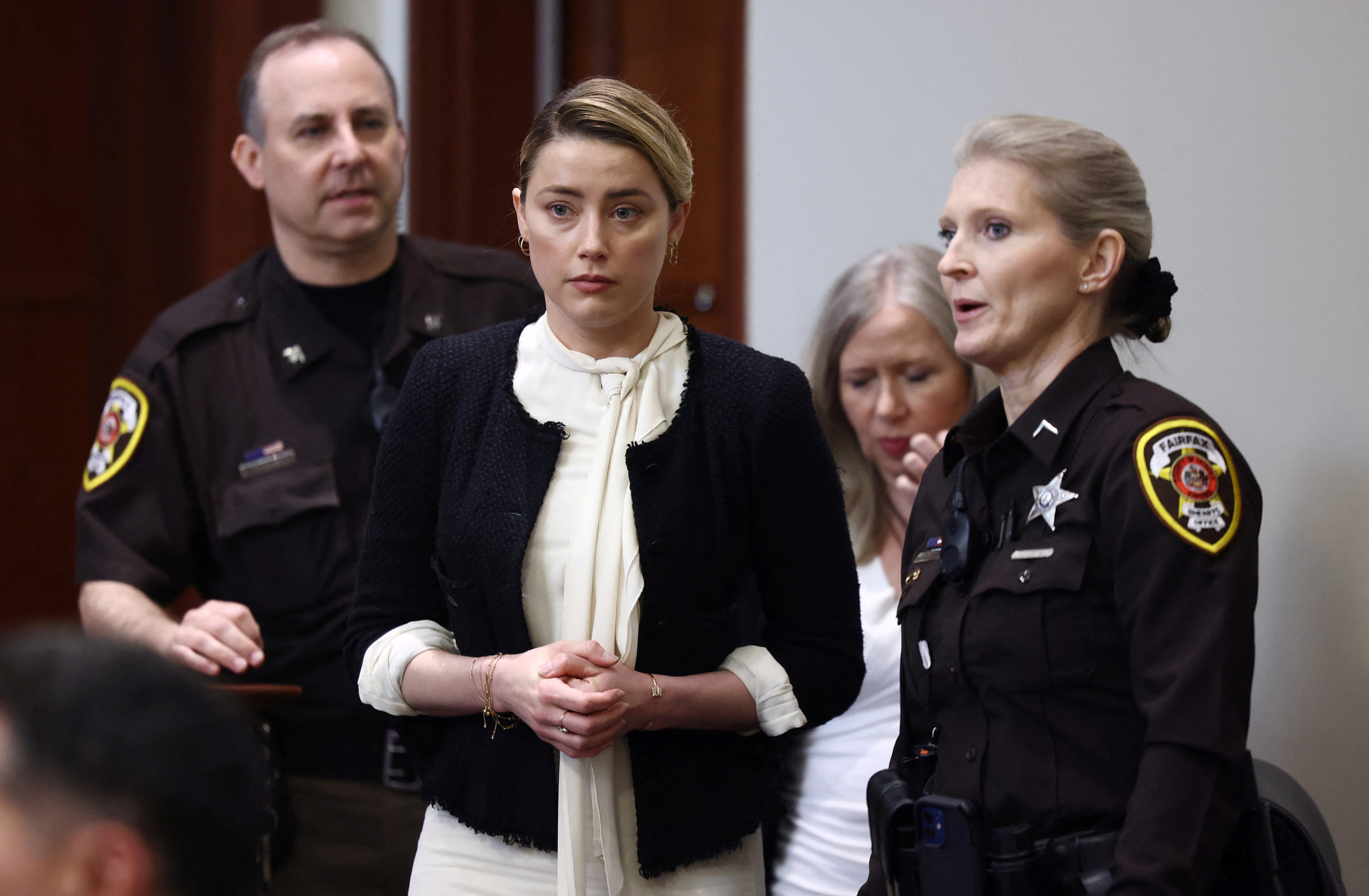 Amber Heard's return to the courtroom after a break in Fairfax County Circuit Court, Va. (Jim Lo Scalzo/REUTERS)