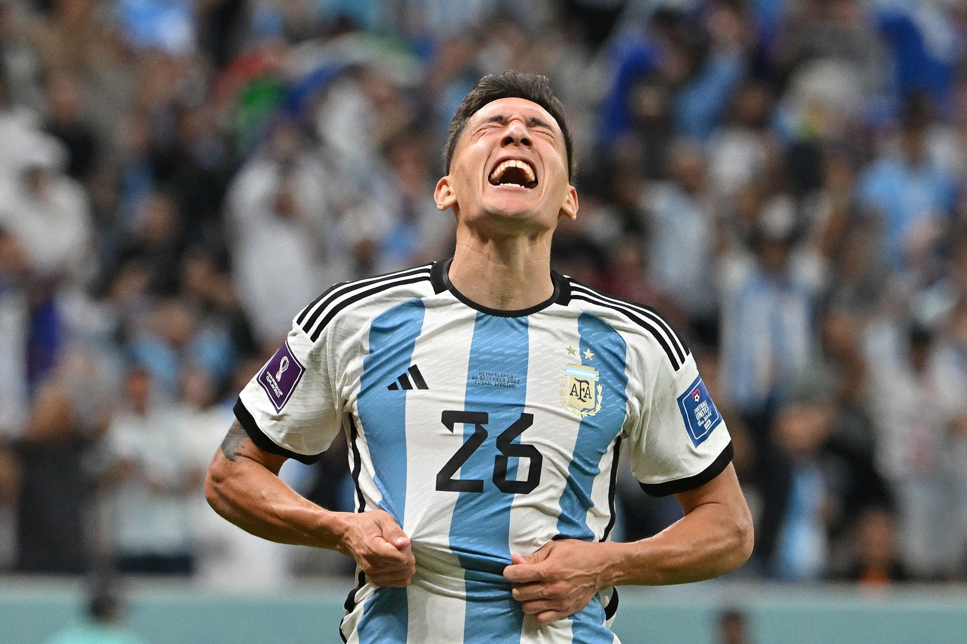 Argentina's defender #26 Nahuel Molina celebrates scoring his team's first goal during the Qatar 2022 World Cup quarter-final football match between Netherlands and Argentina at Lusail Stadium, north of Doha, on December 9, 2022. (Photo by Alberto PIZZOLI / AFP)
