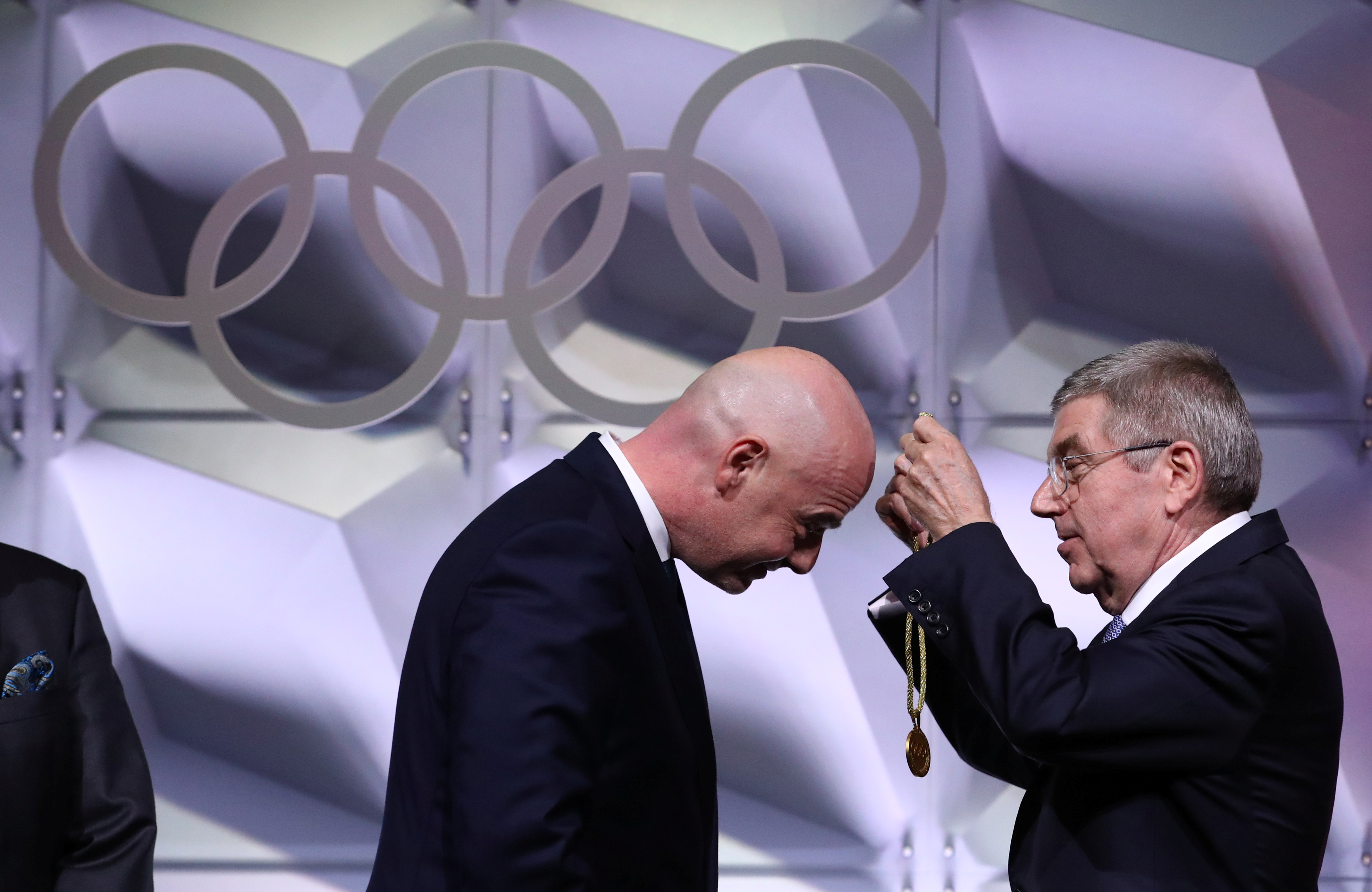Thomas Bach, President of the International Olympic Committee (IOC) congratulates FIFA president Gianni Infantino after his election as IOC member during the 135th Session in Lausanne, Switzerland, January 10, 2020.  REUTERS/Denis Balibouse