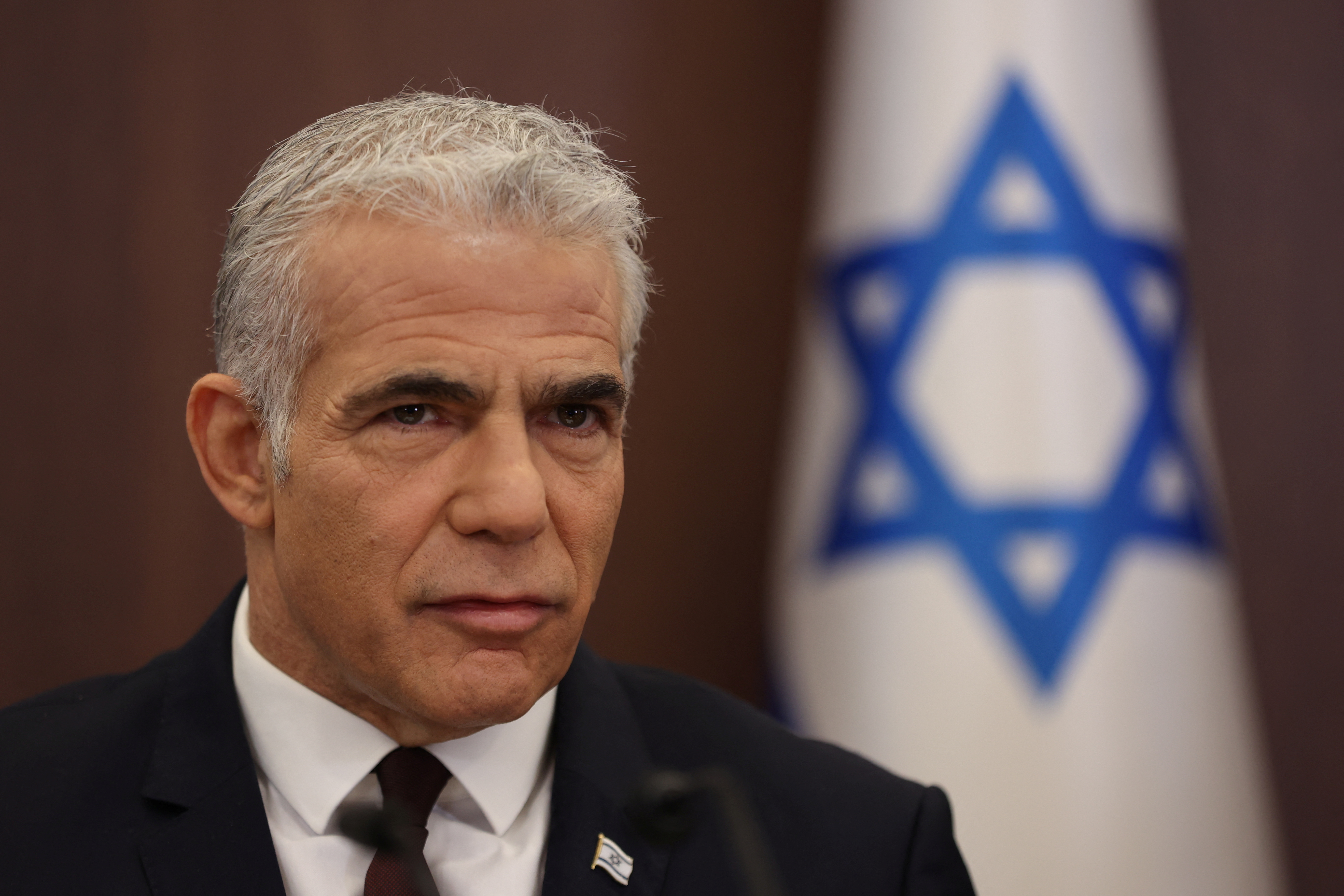 Israeli Prime Minister Yair Lapid attends a cabinet meeting at the prime minister's office in Jerusalem, on October 23, 2022. Abir Sultan/Pool via REUTERS