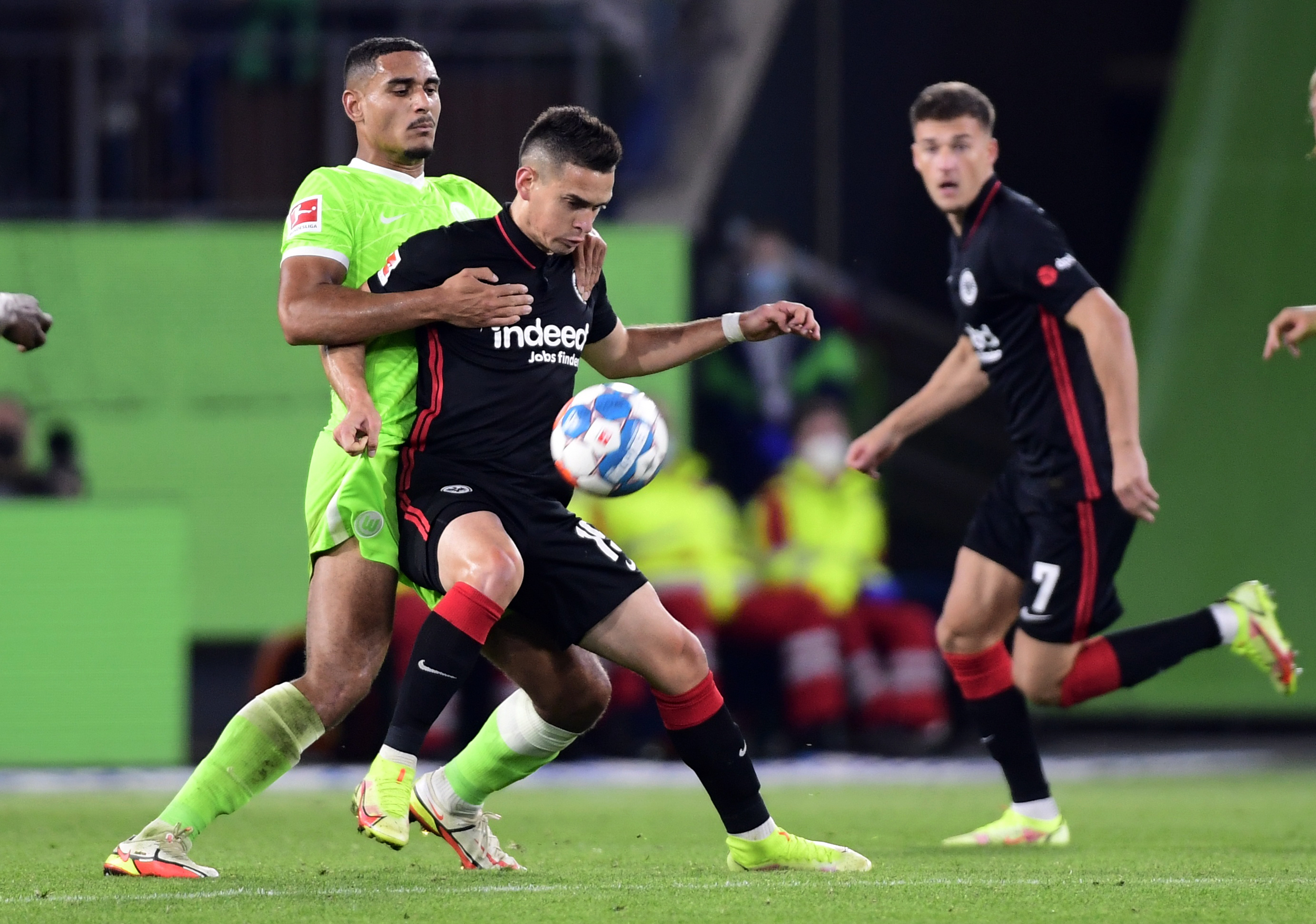 Soccer Football - Bundesliga - VfL Wolfsburg v Eintracht Frankfurt - Volkswagen Arena, Wolfsburg, Germany - September 19, 2021 Eintracht Frankfurt's Rafael Santos Borre in action with VfL Wolfsburg's Maxence Lacroix REUTERS/Fabian Bimmer DFL regulations prohibit any use of photographs as image sequences and/or quasi-video.