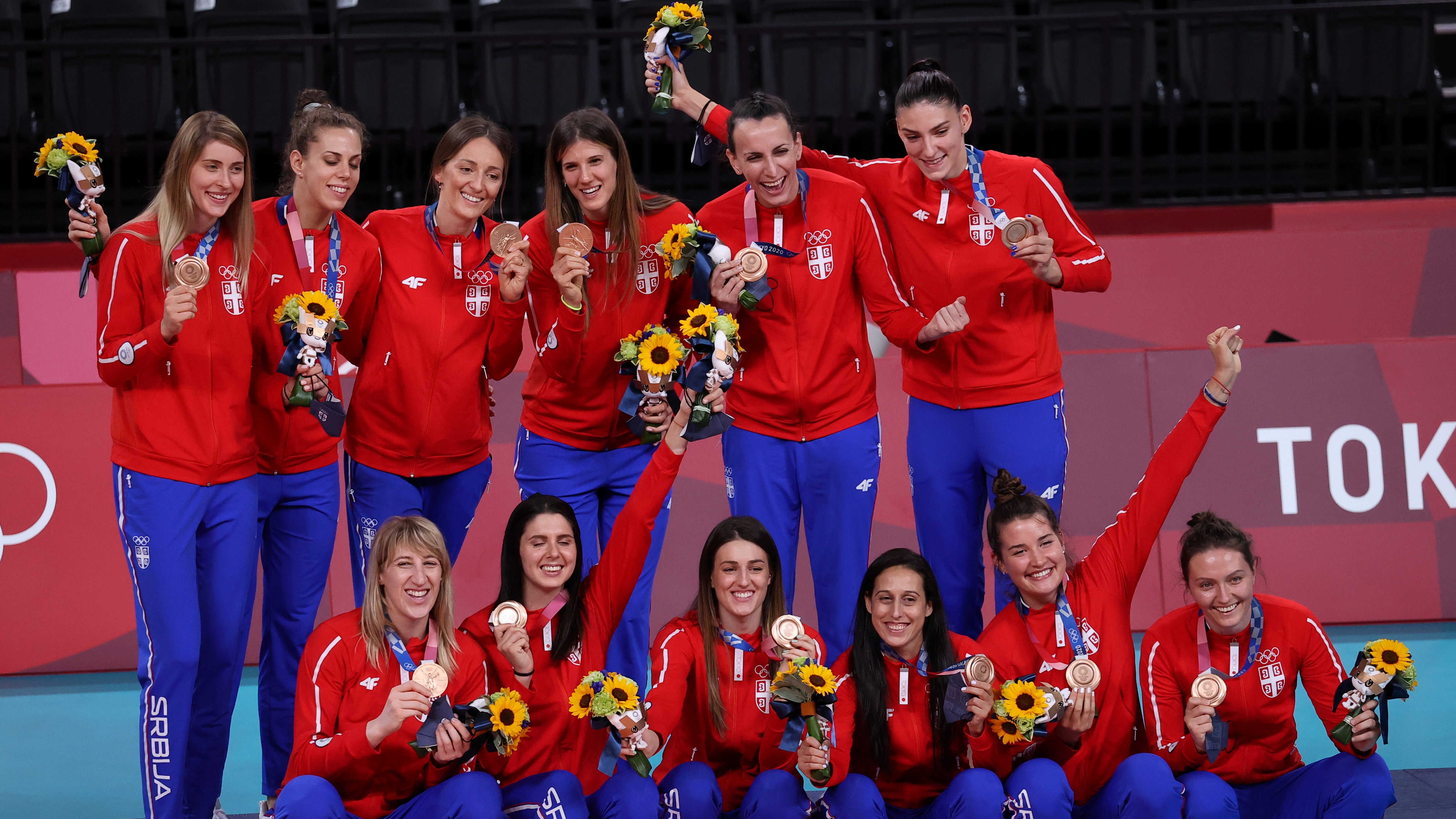 Tokyo 2020 Olympics - Volleyball - Women - Medal Ceremony - Ariake Arena, Tokyo, Japan – August 8, 2021. Team members of Serbia pose with their bronze medals after the match. REUTERS/Ivan Alvarado