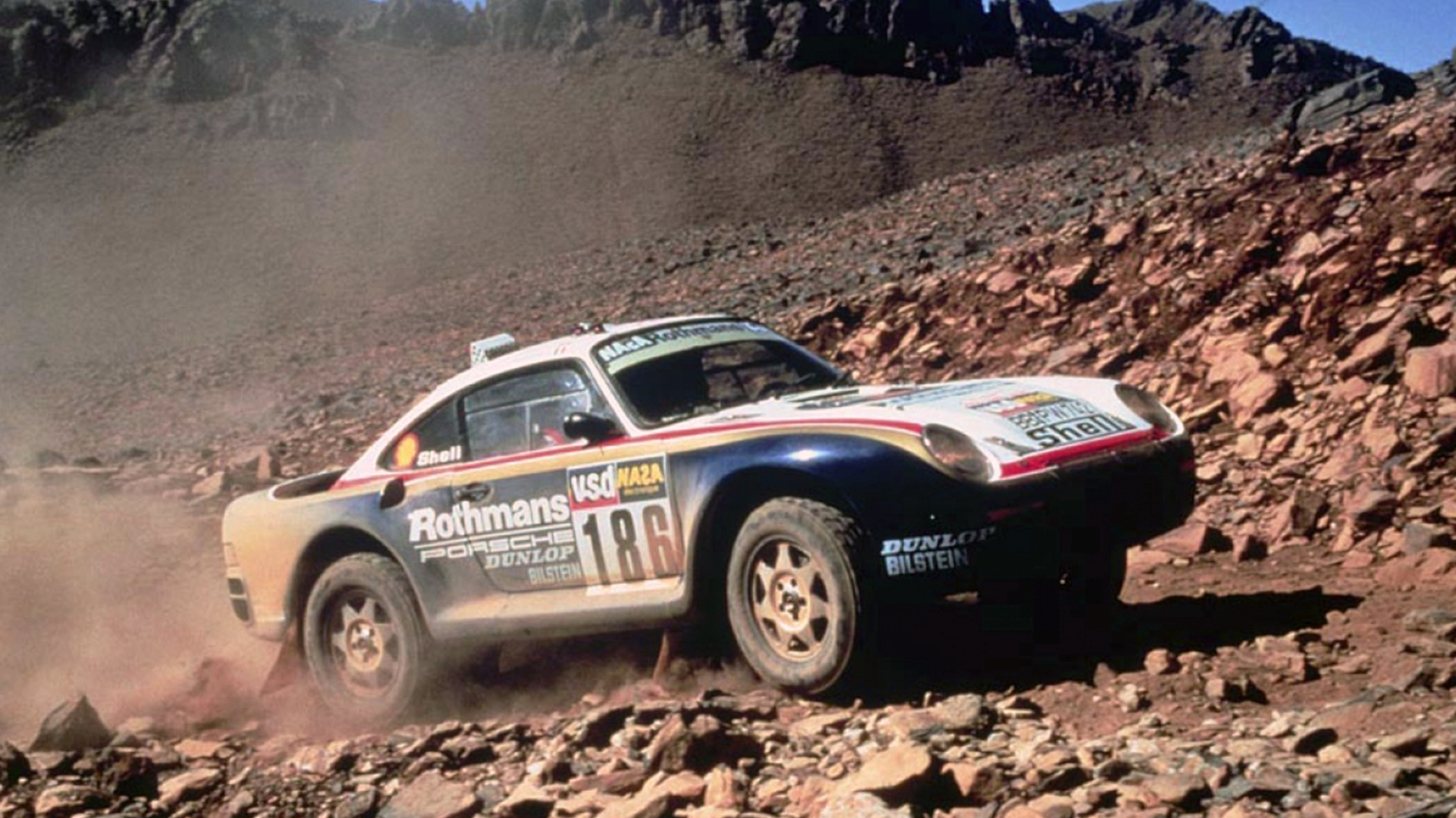 El Porsche 959 fue el primer prototipo desarrollado para el Dakar en 1985. Ganó la edición del 86 y le abrió la puerta a todas las fábricas de autos para tomar el Dakar como un desafío tecnológico